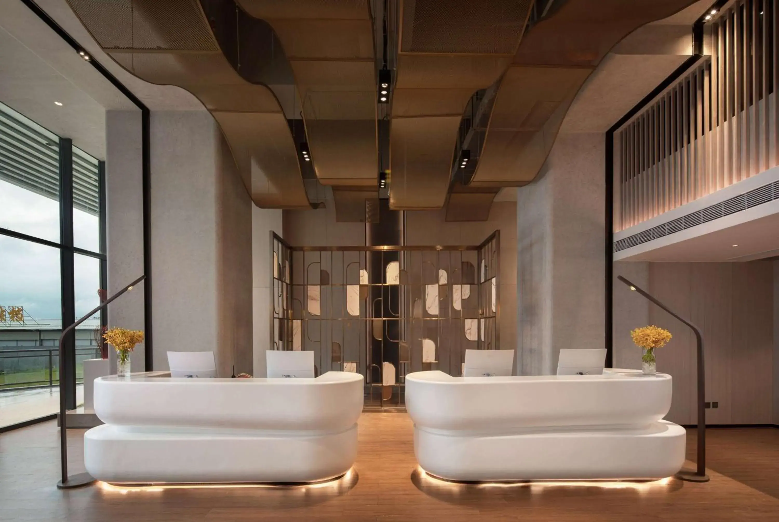 Lobby or reception in Ramada by Wyndham Huizhou Double Moon Bay Lobby or reception in Ramada by Wyndham Huizhou Double Moon Bay