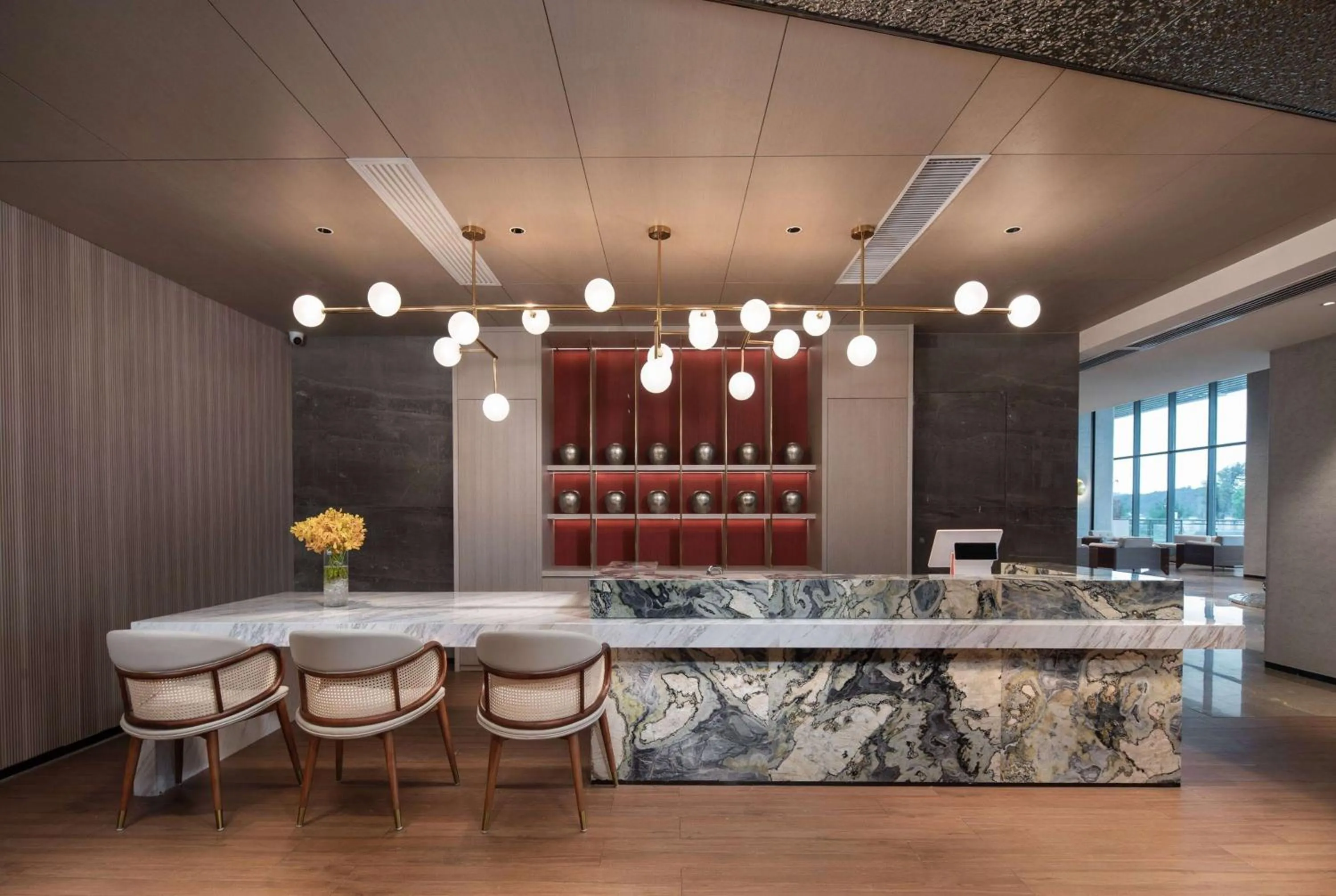 Lobby or reception in Ramada by Wyndham Huizhou Double Moon Bay