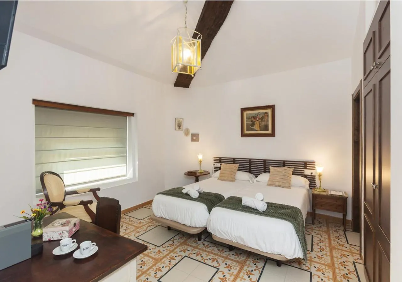 Photo of the whole room, Bed in Art Boutique La Casona de las Flores