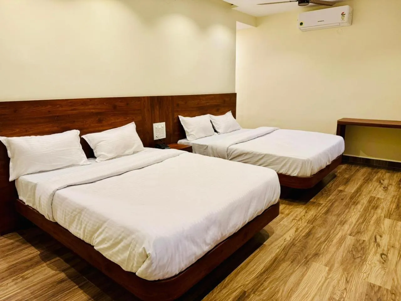 Bed in S K Legacy Hotel