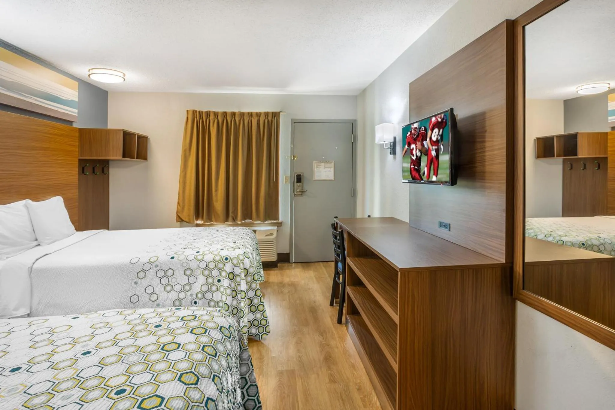 Photo of the whole room, Bed in HomeTowne Studios by Red Roof Lancaster