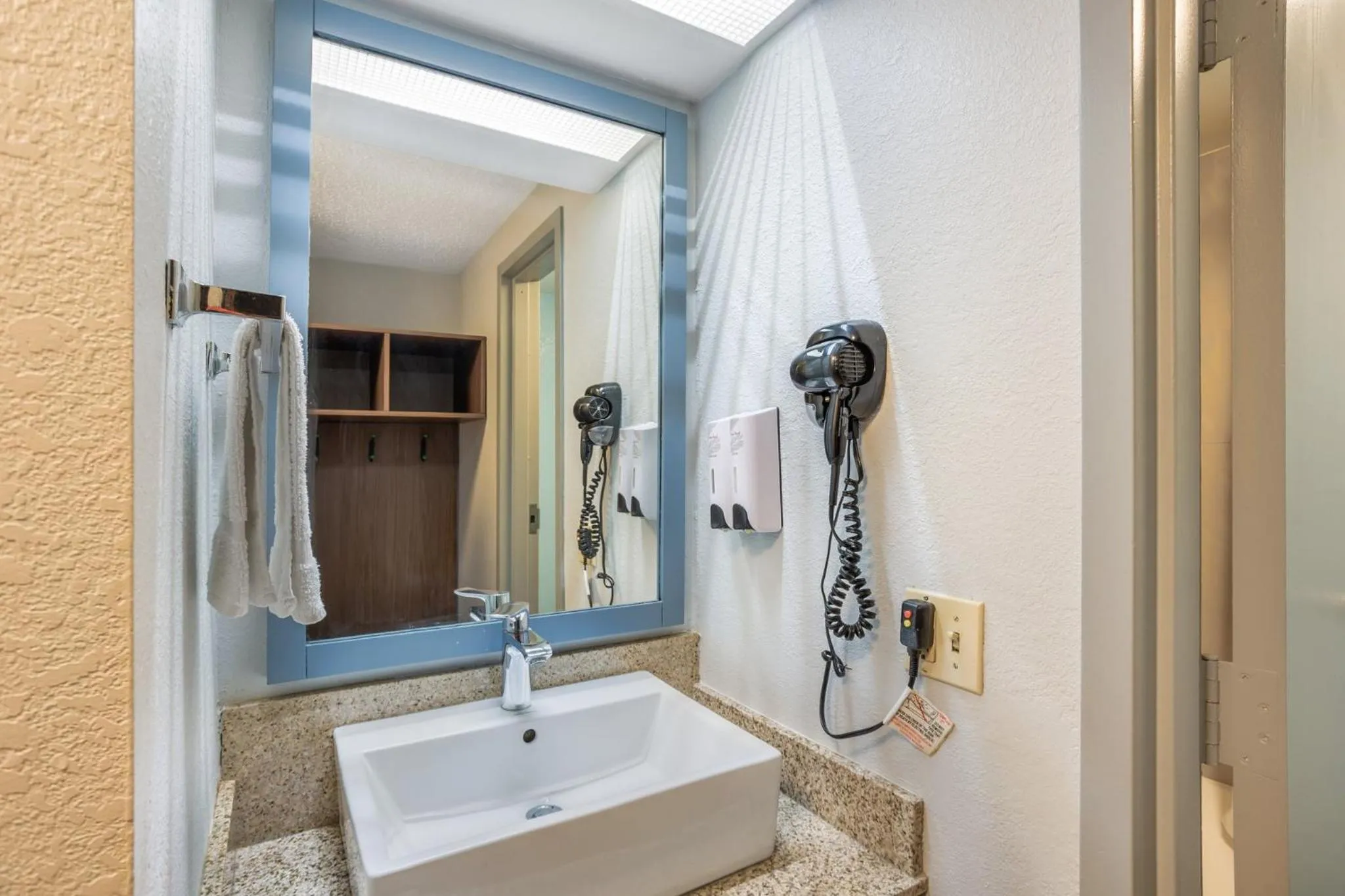 Bathroom in HomeTowne Studios by Red Roof Lancaster