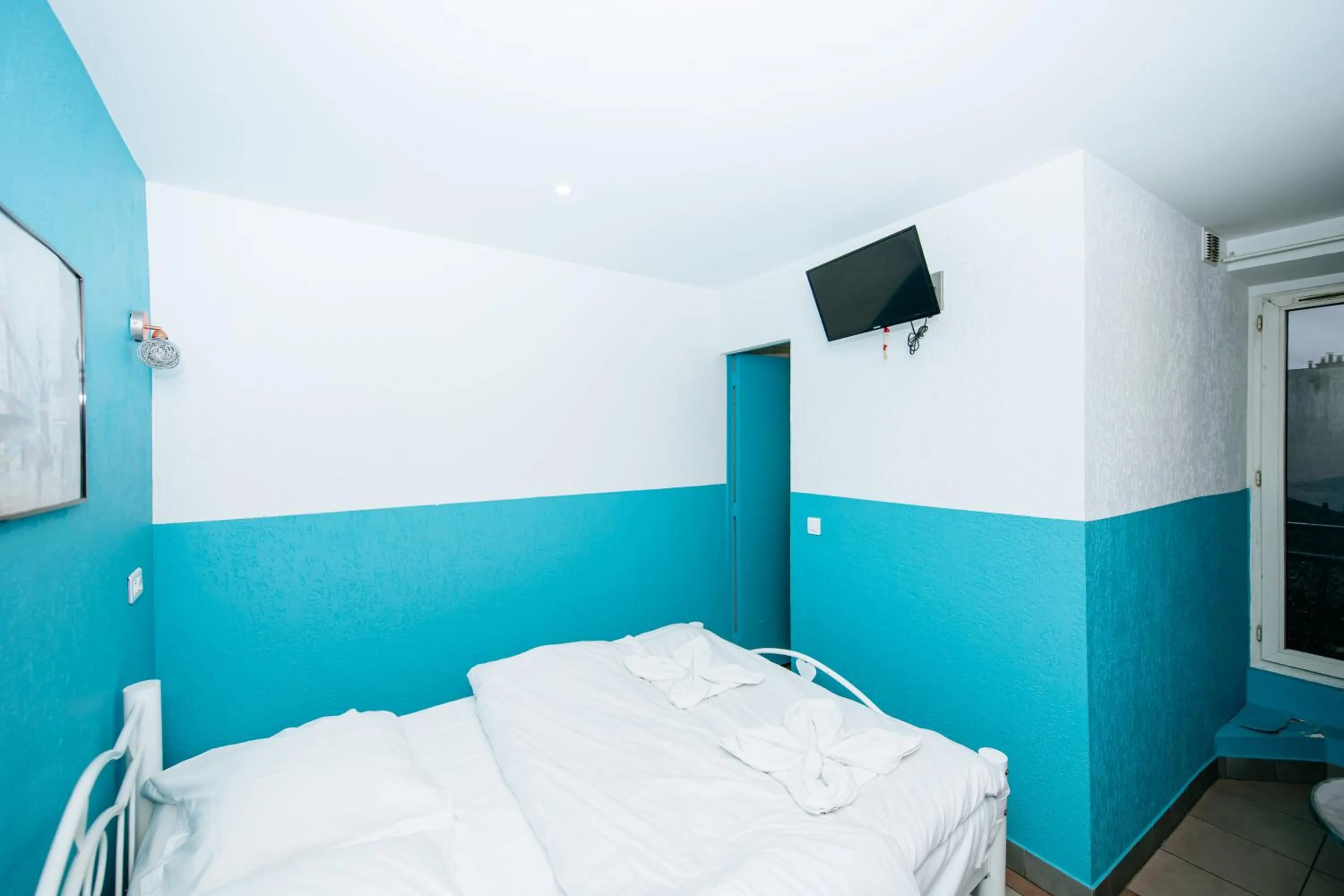 Photo of the whole room, Bed in Hotel De La Poste