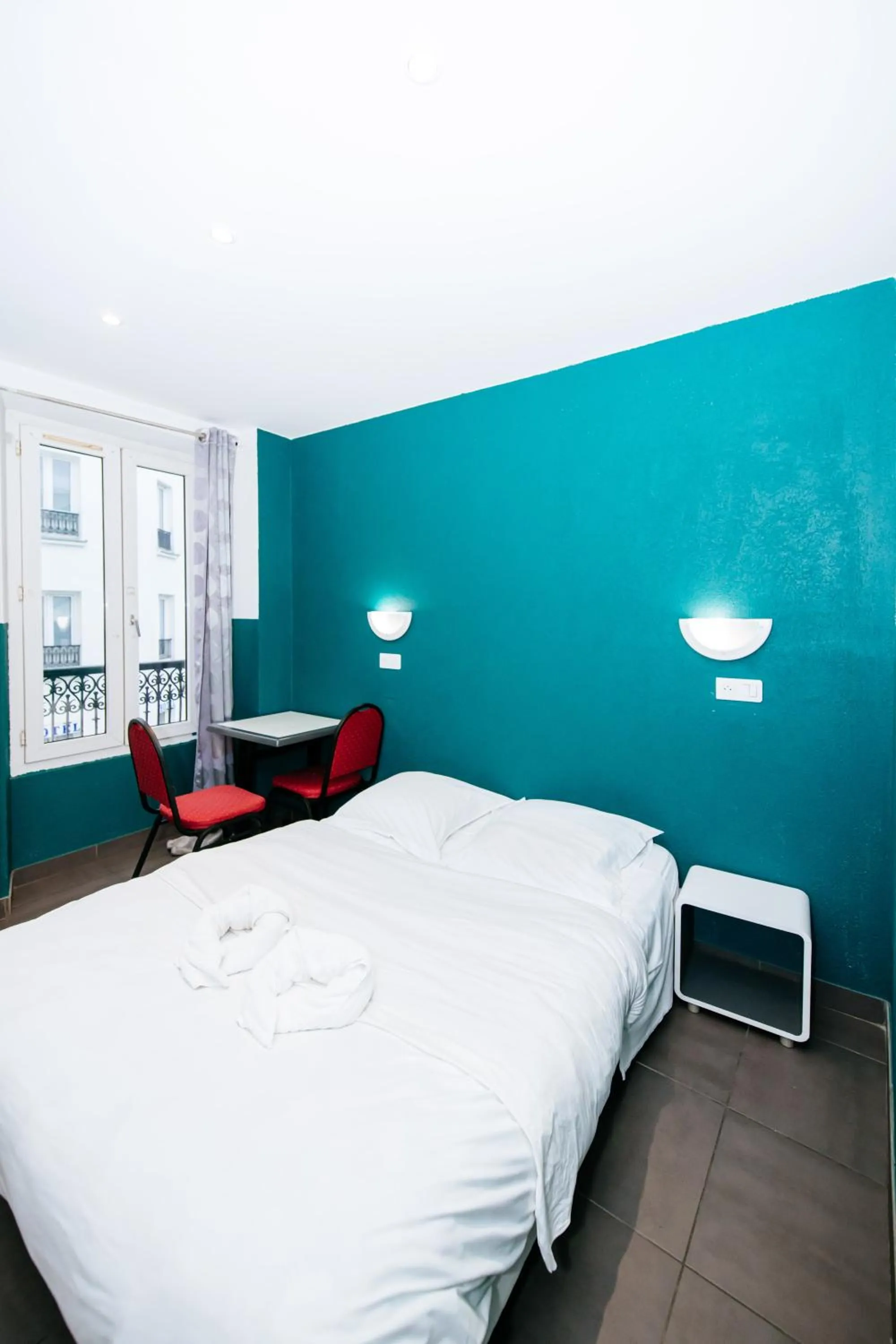 Bed in Hotel De La Poste