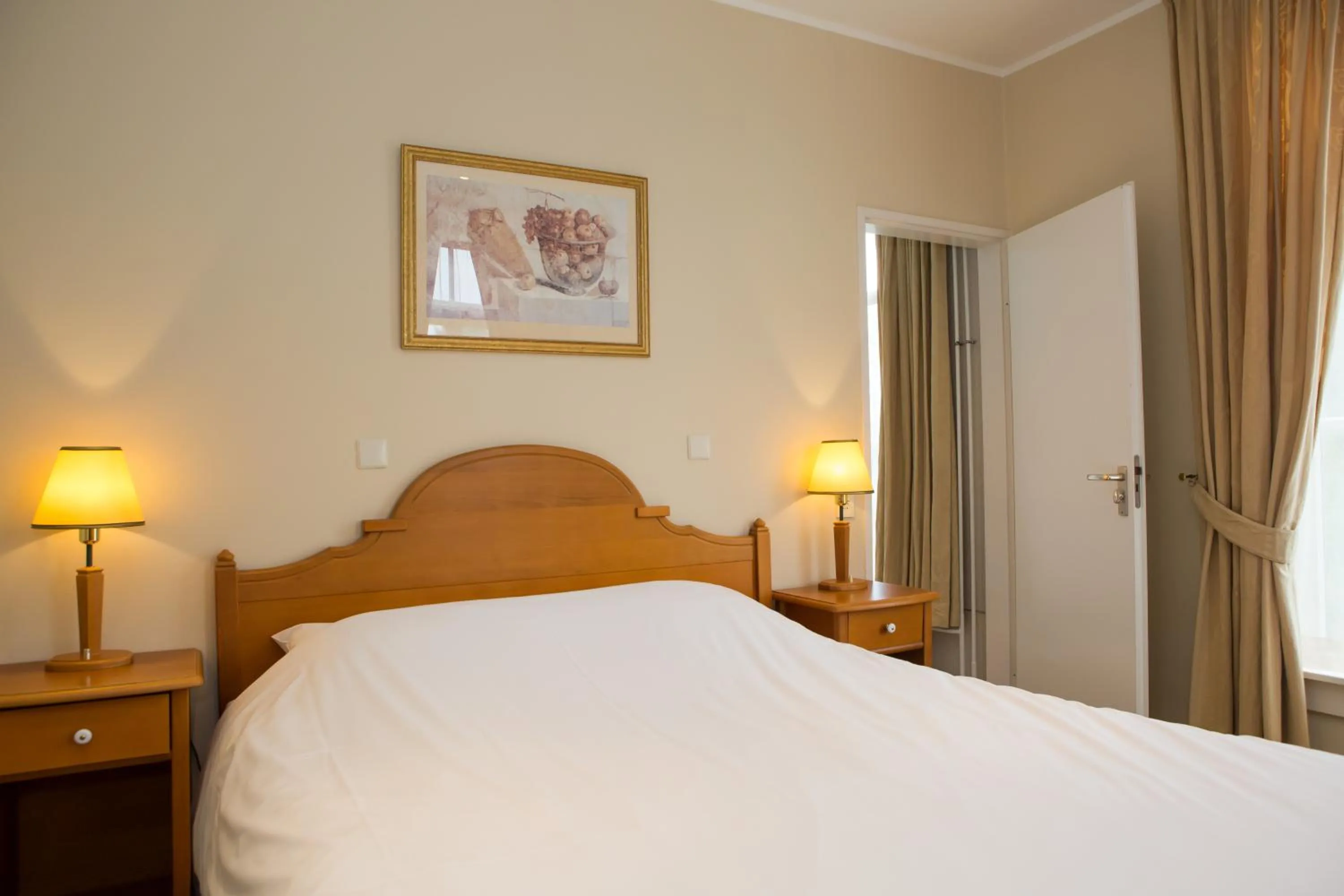 Bed in Landhotel De Hoofdige Boer