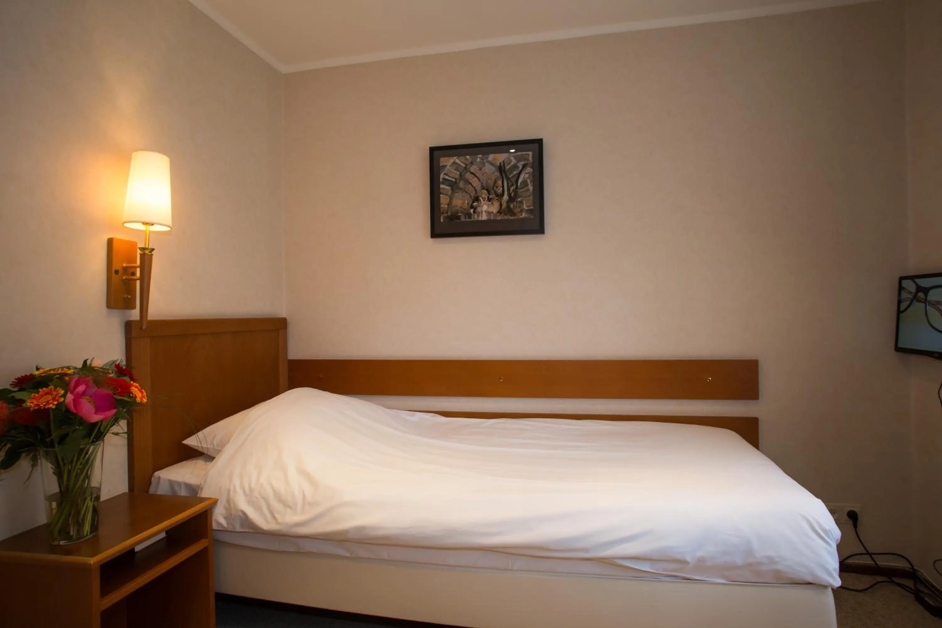 Bed in Landhotel De Hoofdige Boer