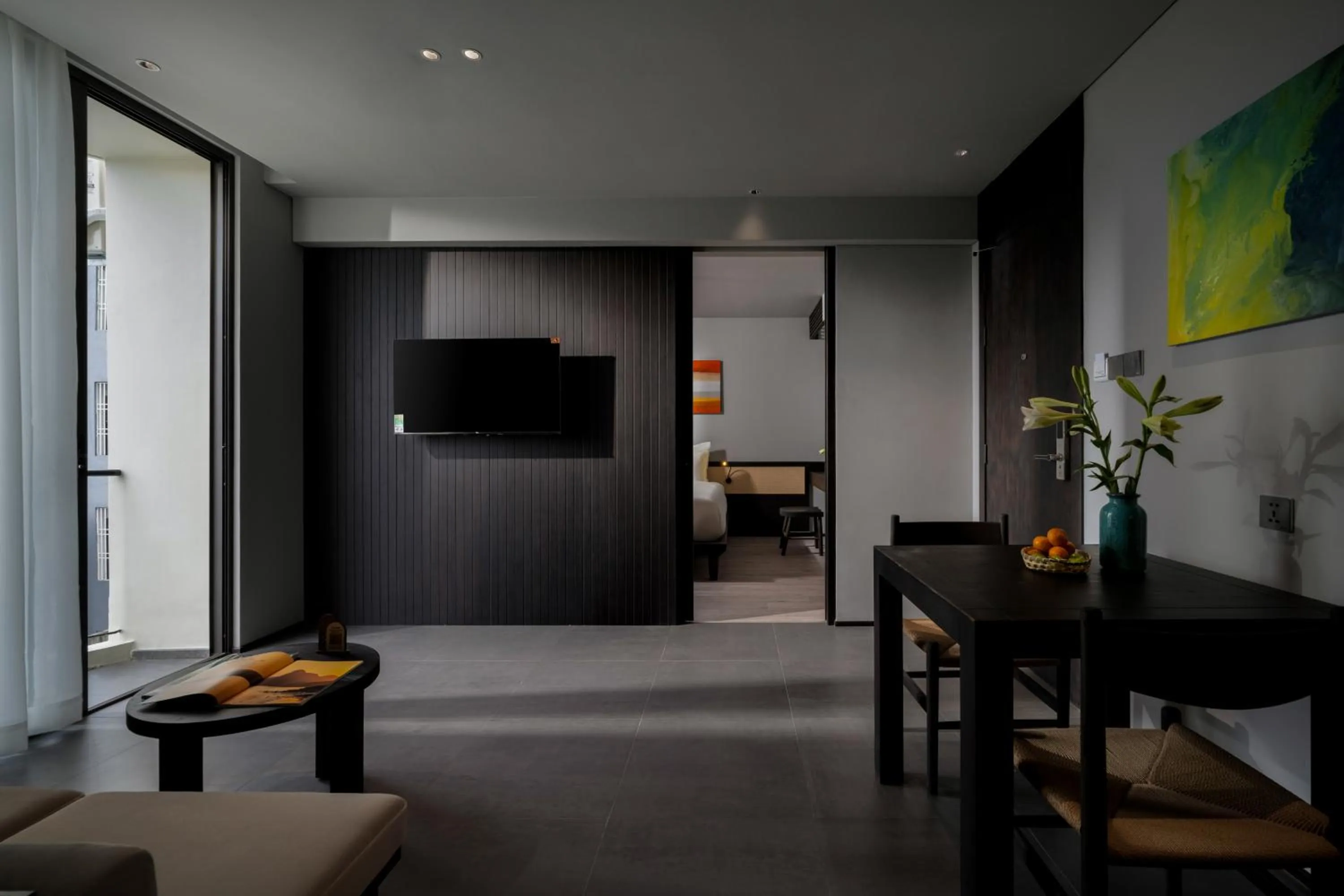 Communal lounge/ TV room in Thè HEM Hotel and Apartment