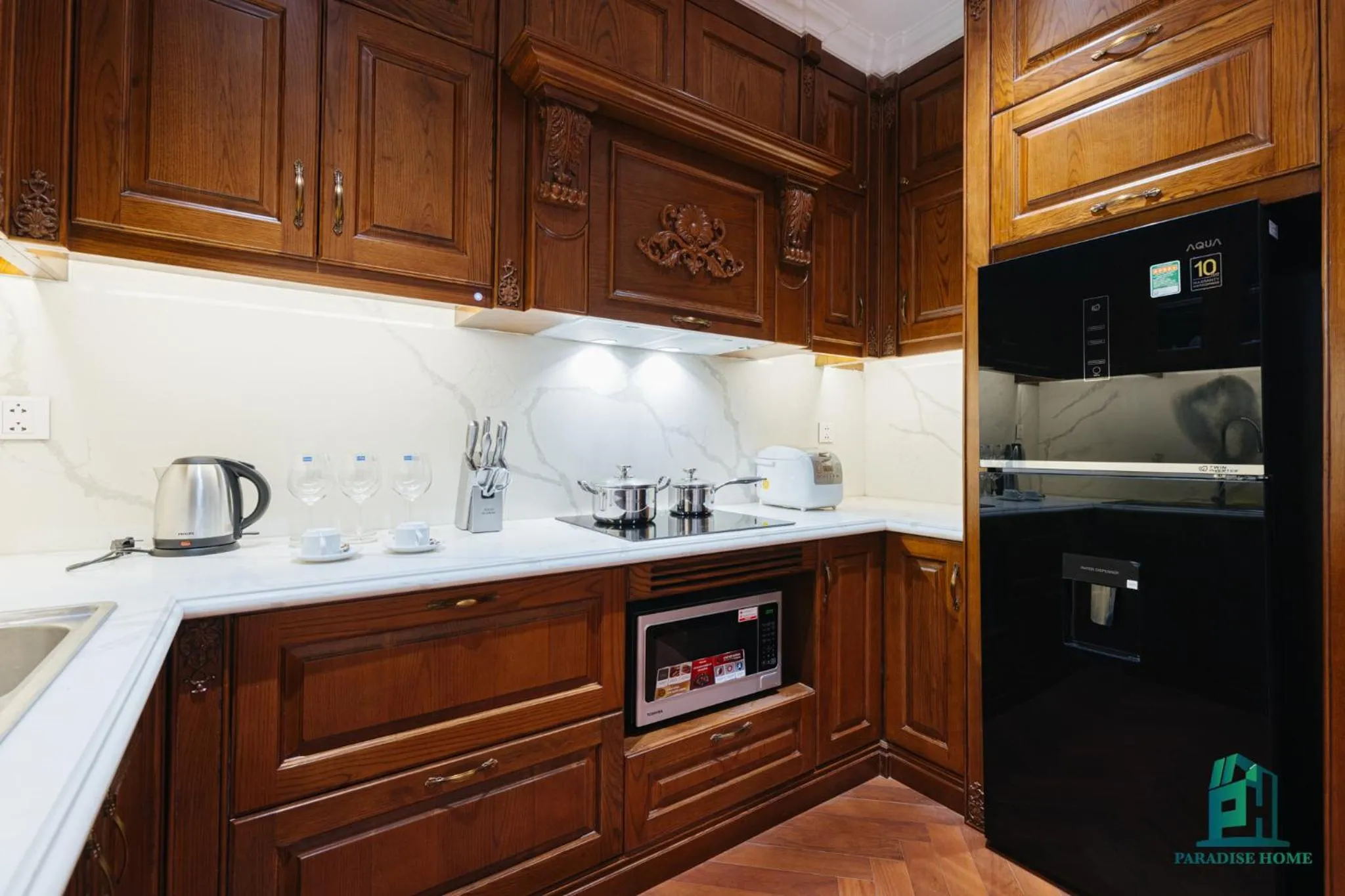 Kitchen or kitchenette in Luxe Paradise Suite Hotel Trich Sai