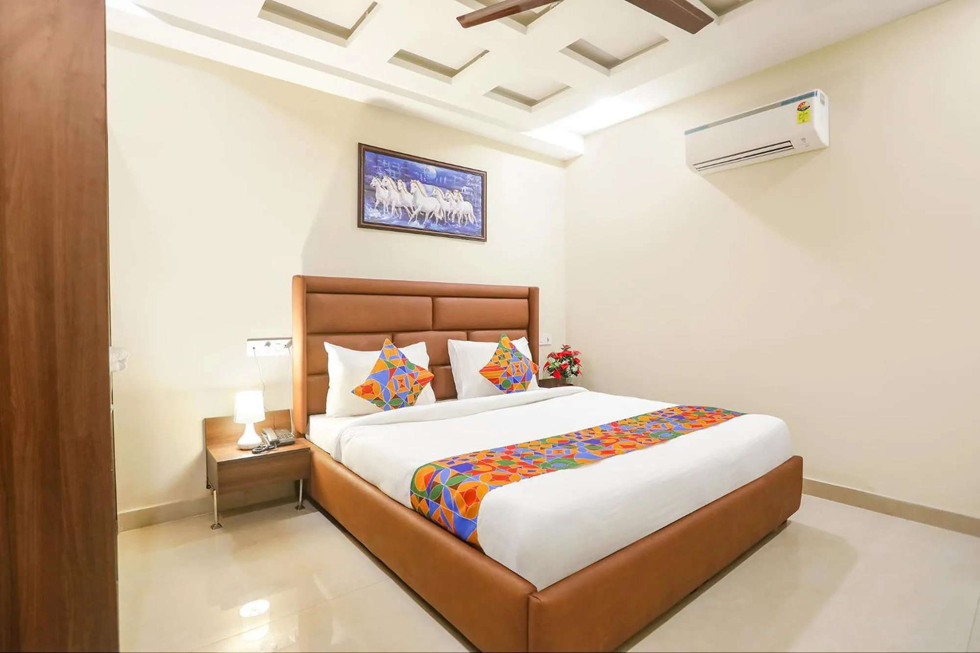 Bed in FabHotel Nirvana Residency