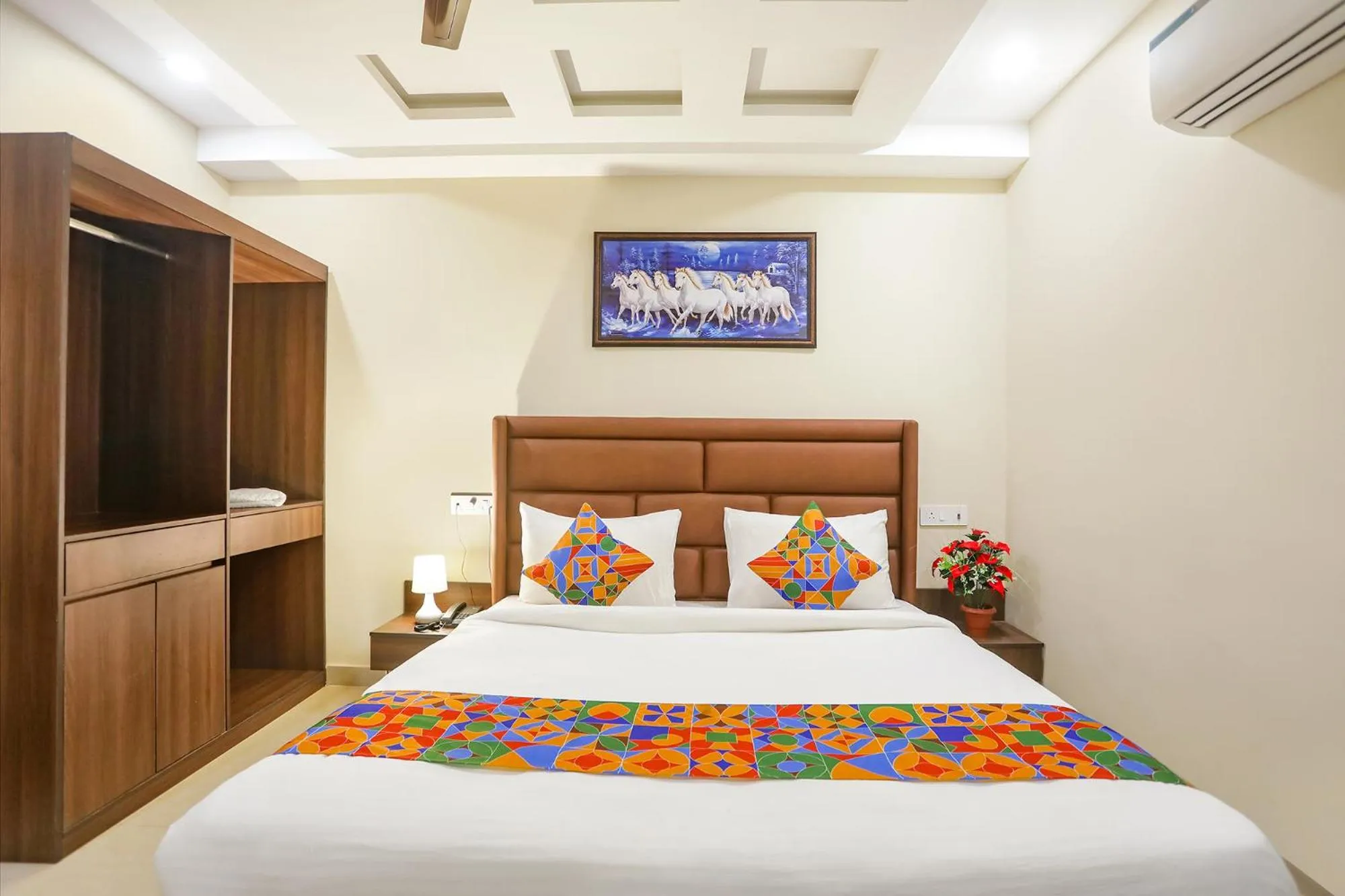 Bed in FabHotel Nirvana Residency