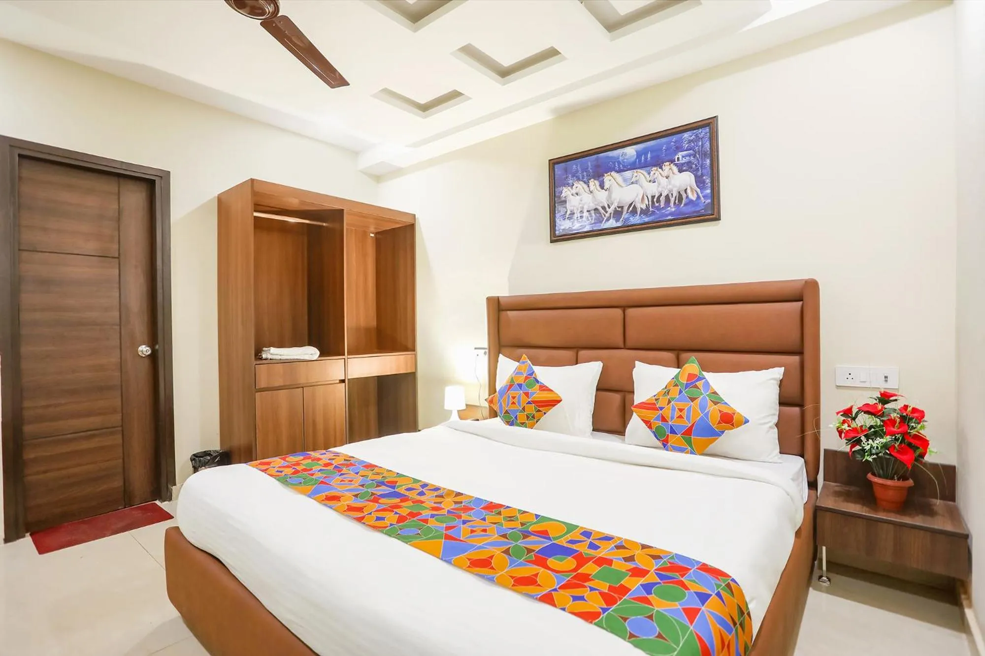 Bed in FabHotel Nirvana Residency