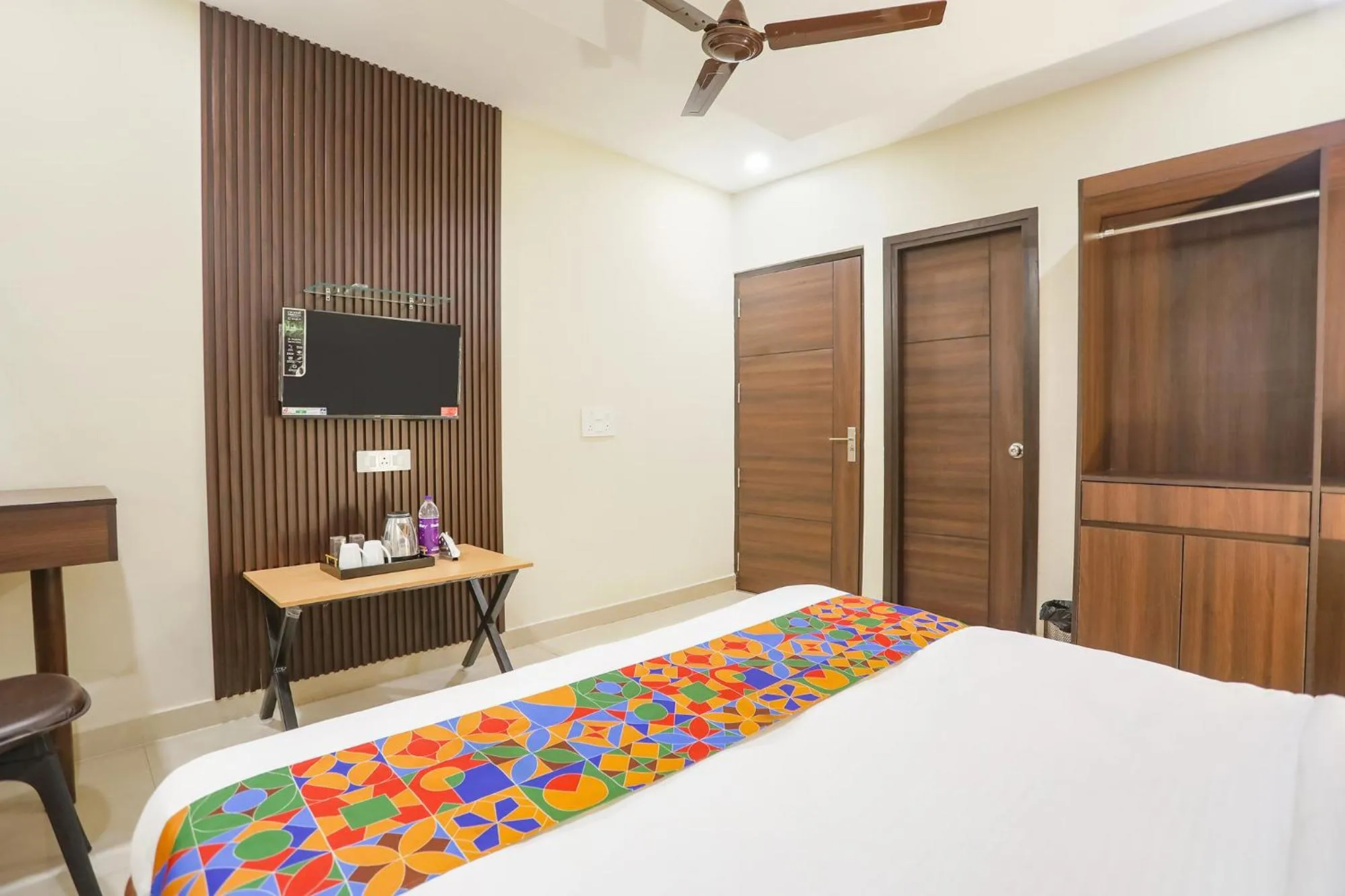 Bed in FabHotel Nirvana Residency