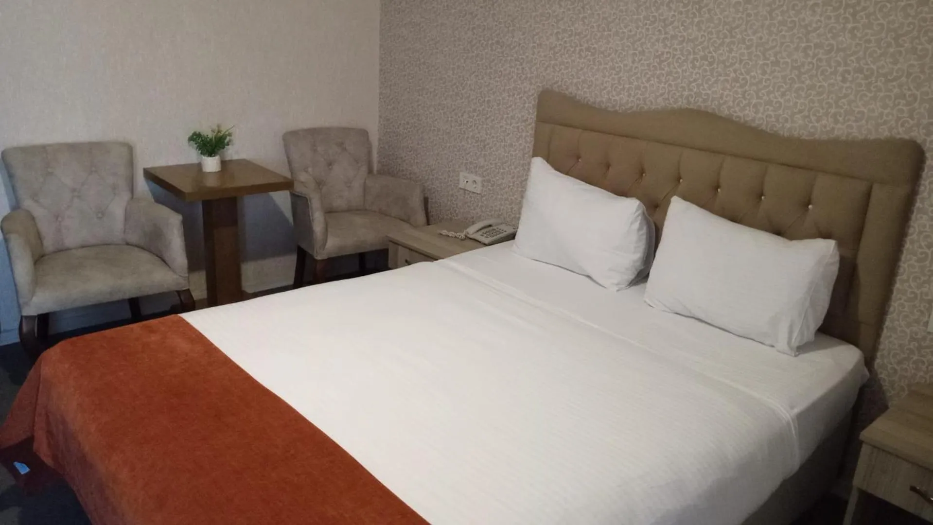 Bed in ANGRAND HOTEL