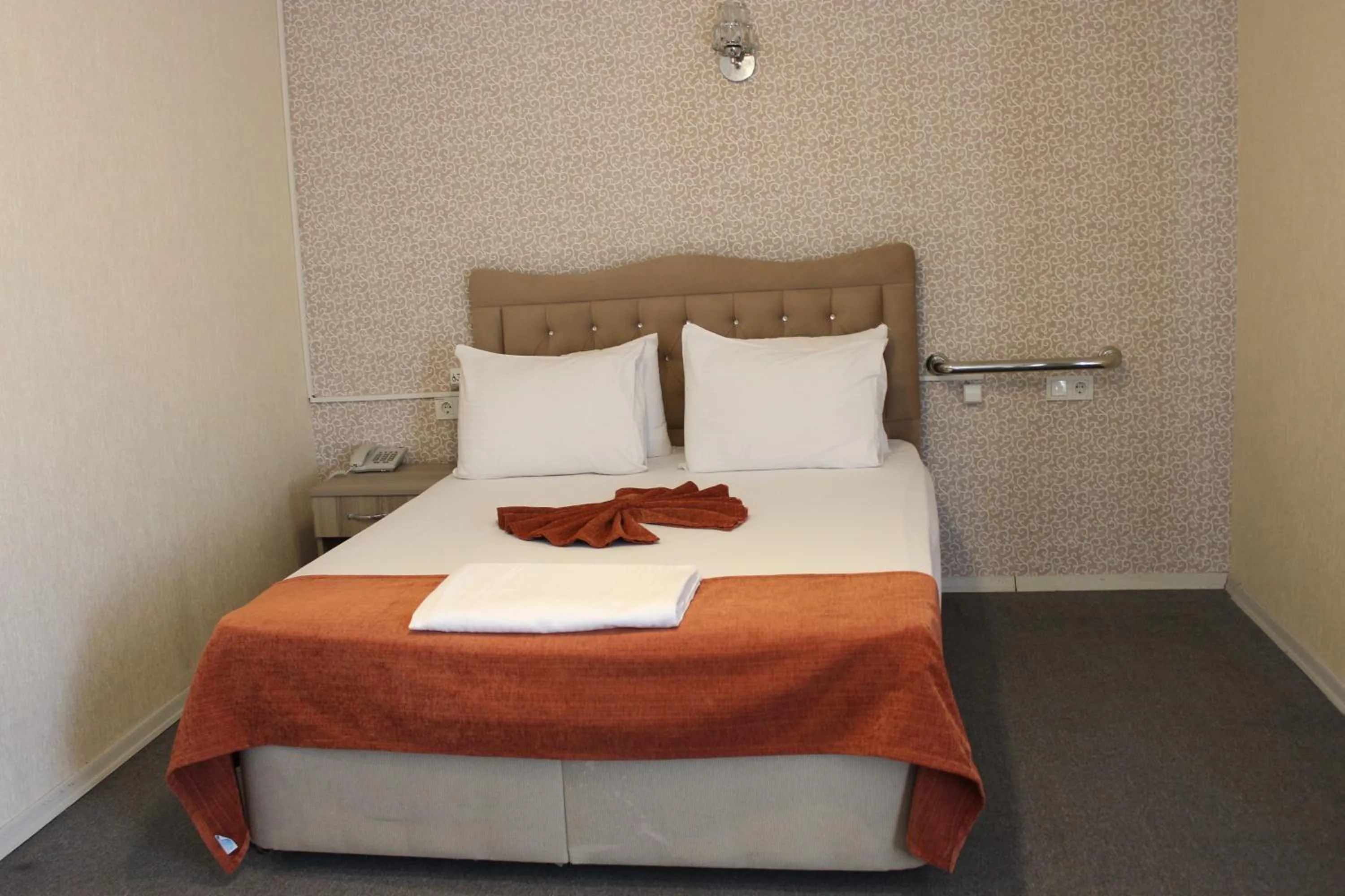 Bed in ANGRAND HOTEL