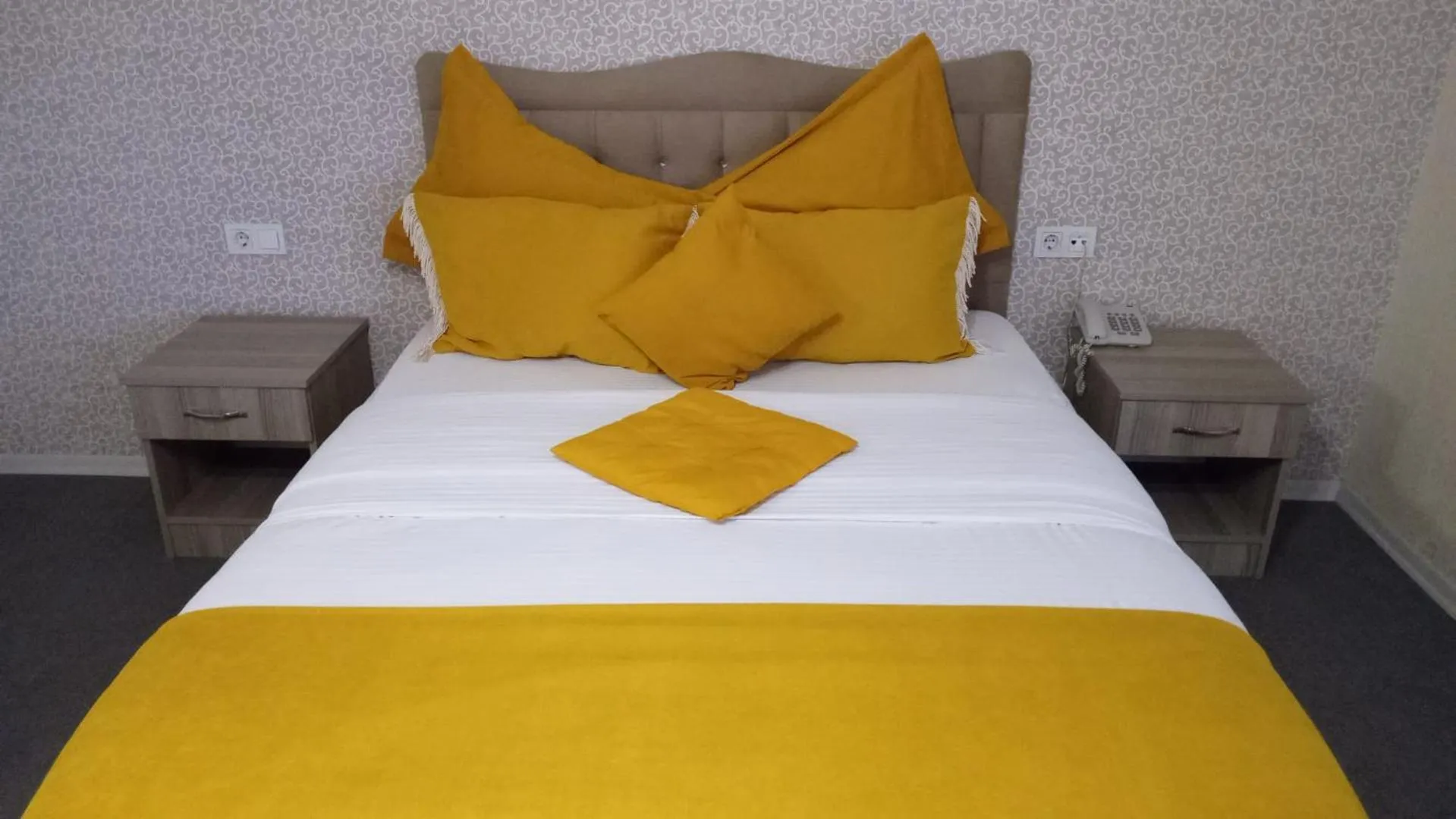 Bed in ANGRAND HOTEL