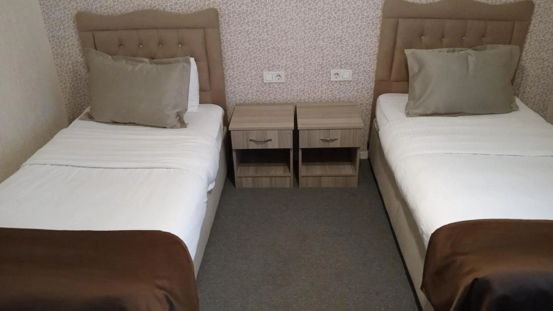 Bed in ANGRAND HOTEL