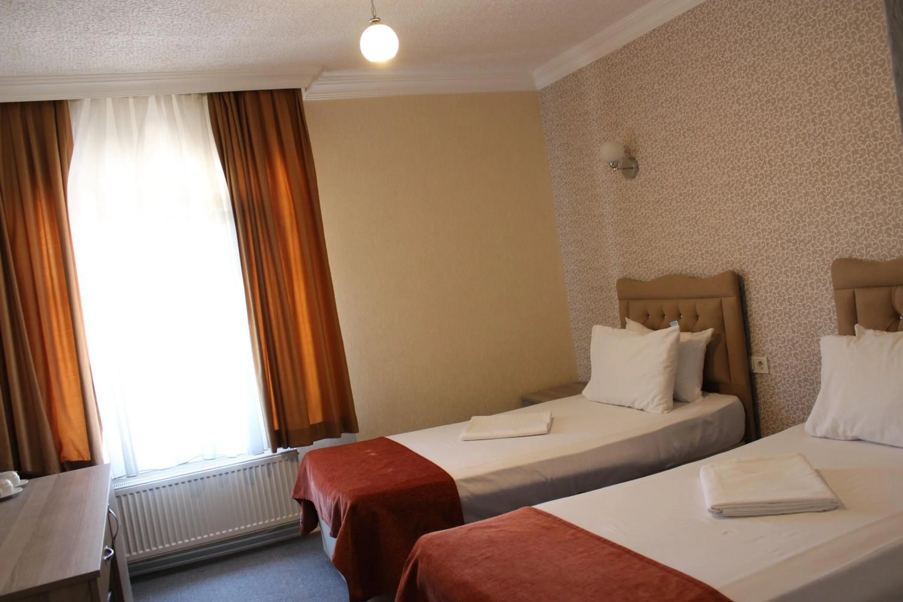 Bed in ANGRAND HOTEL