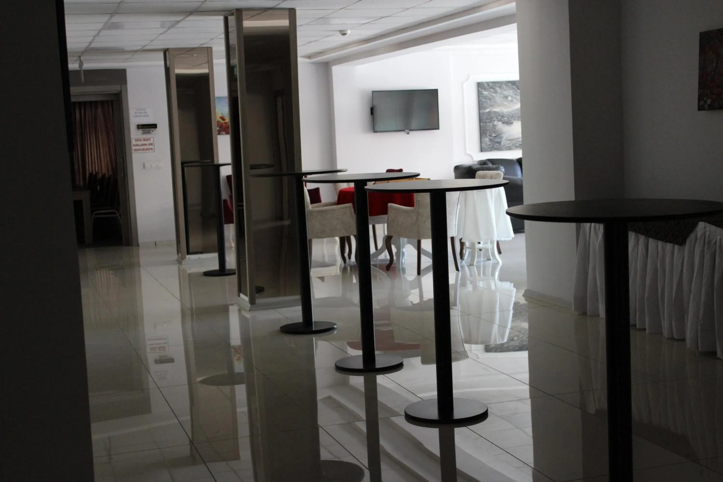 Communal lounge/ TV room in ANGRAND HOTEL