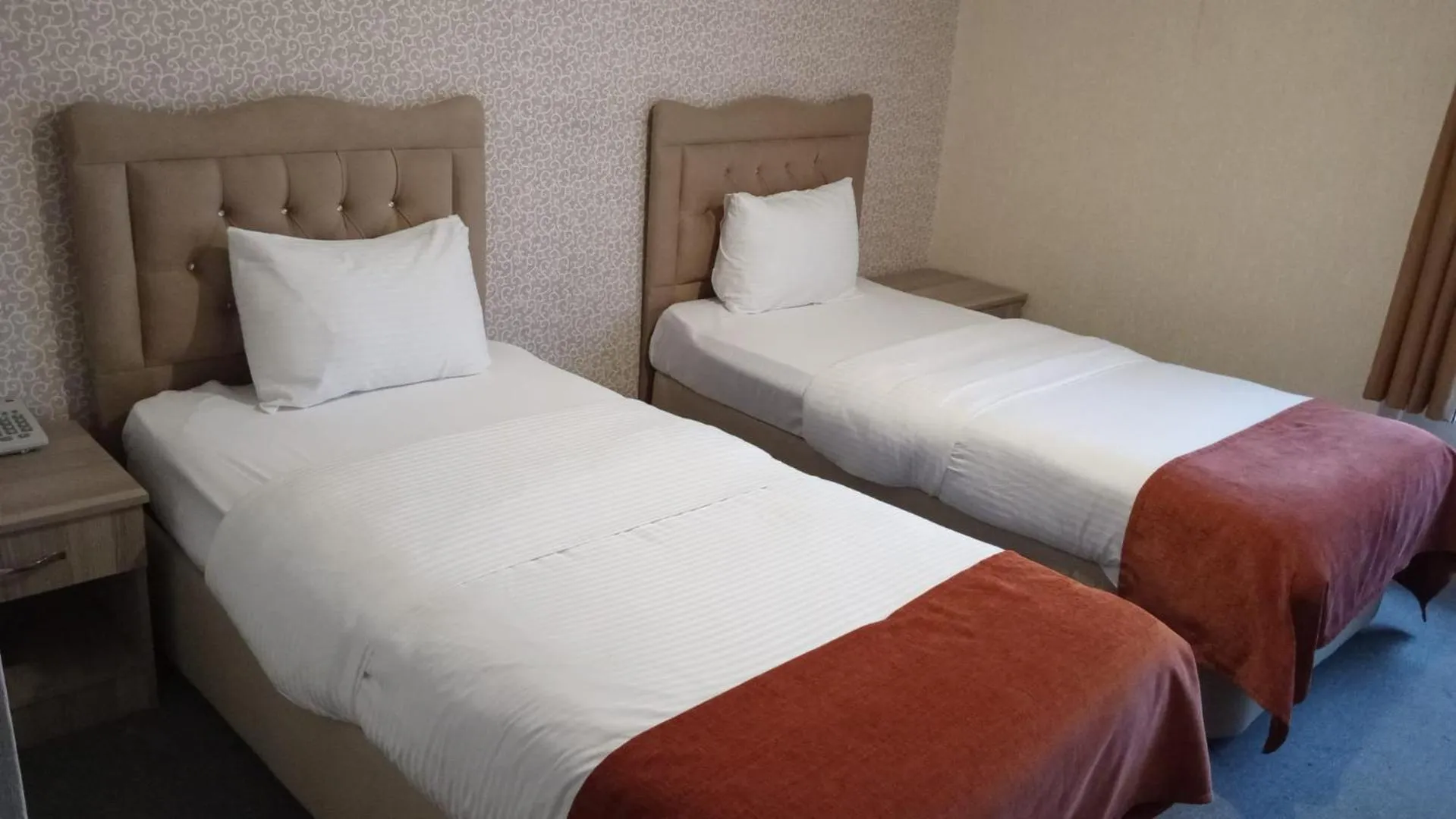 Bed in ANGRAND HOTEL