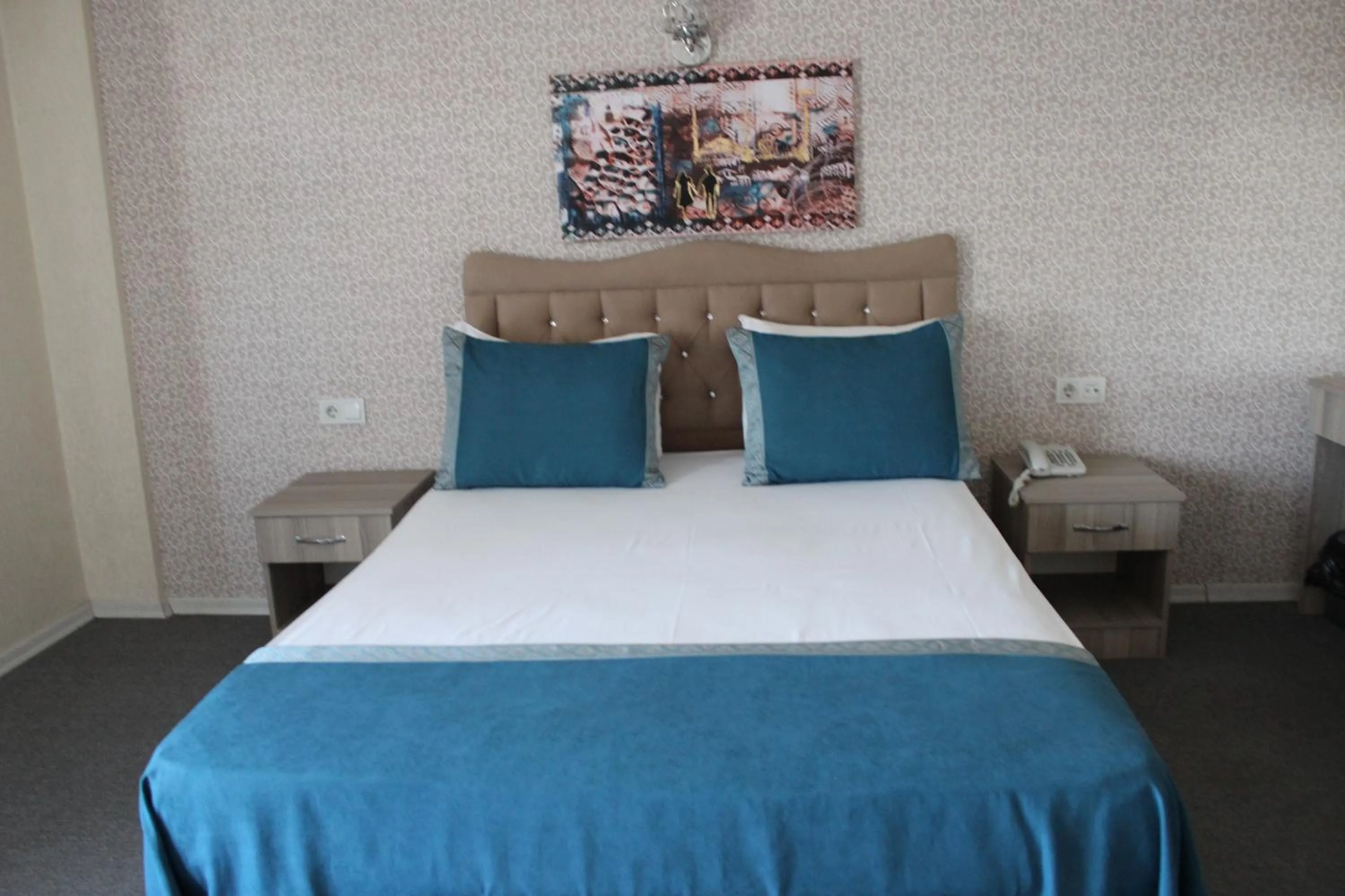 Bed in ANGRAND HOTEL