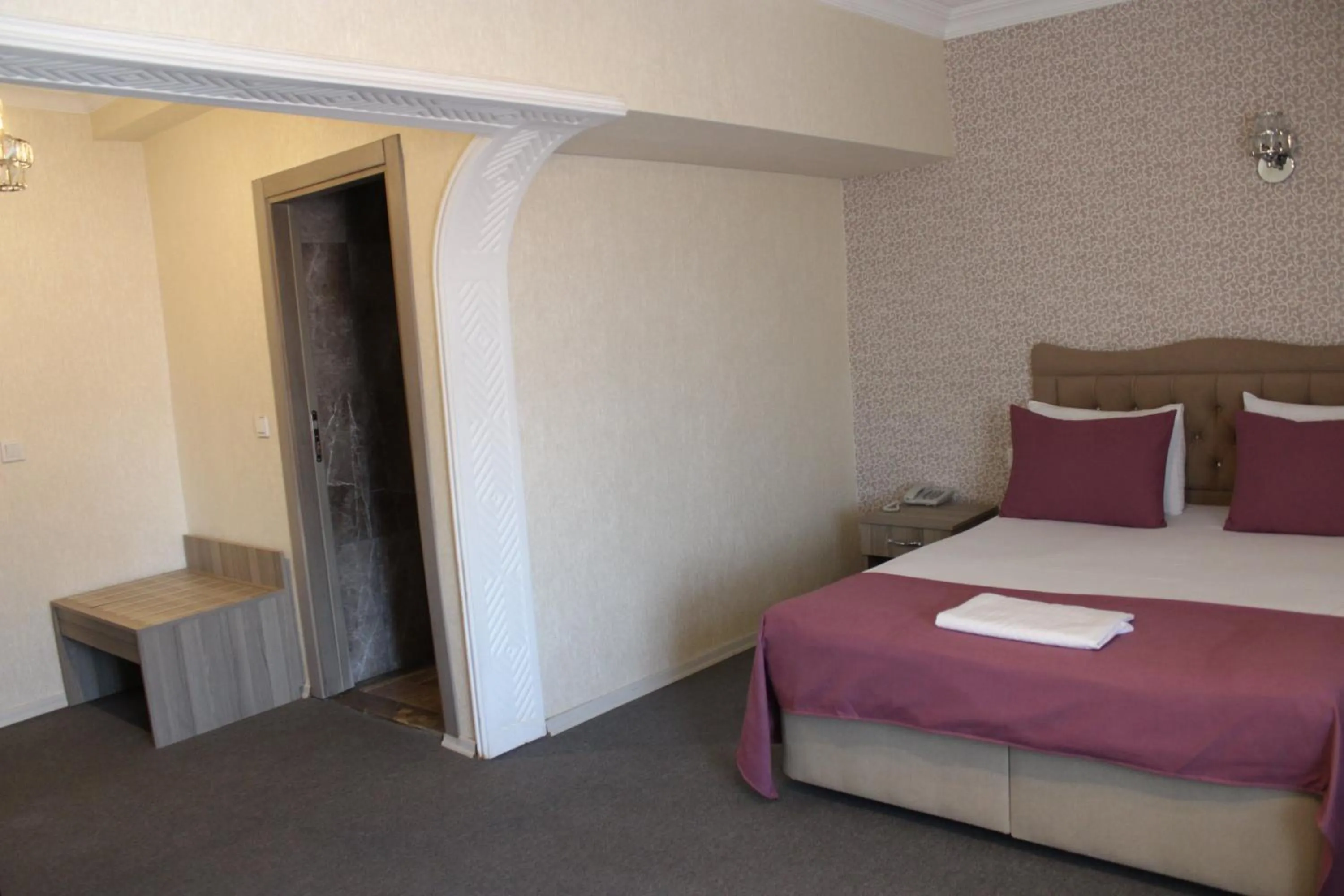 Bed in ANGRAND HOTEL