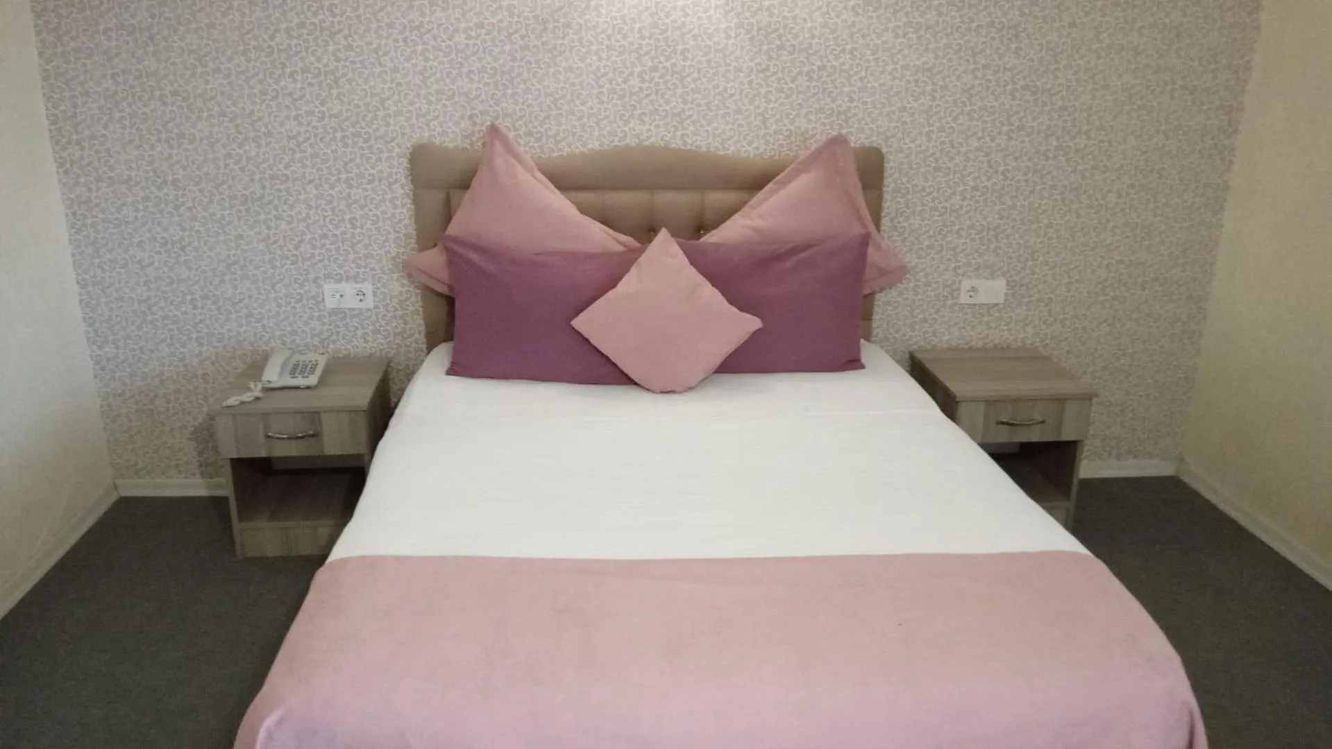 Bed in ANGRAND HOTEL