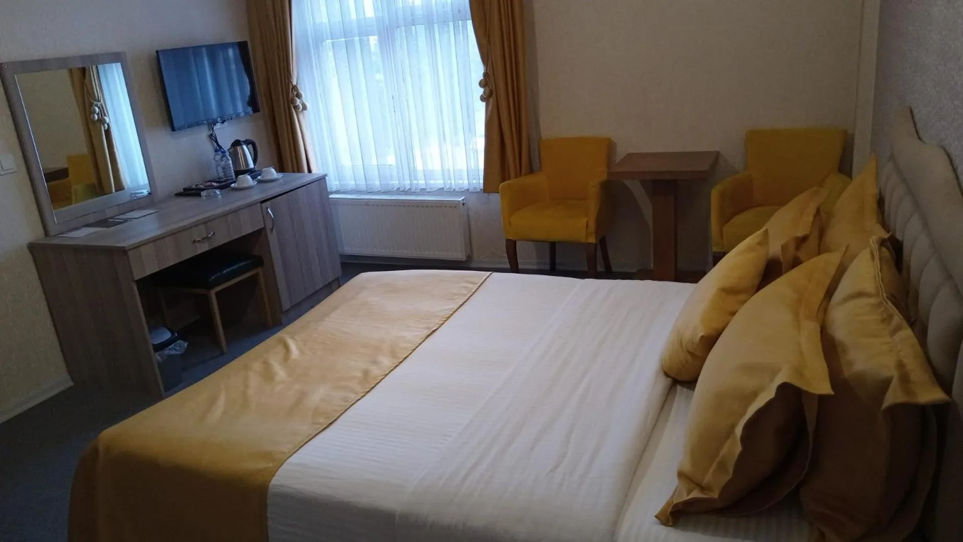 Bed in ANGRAND HOTEL