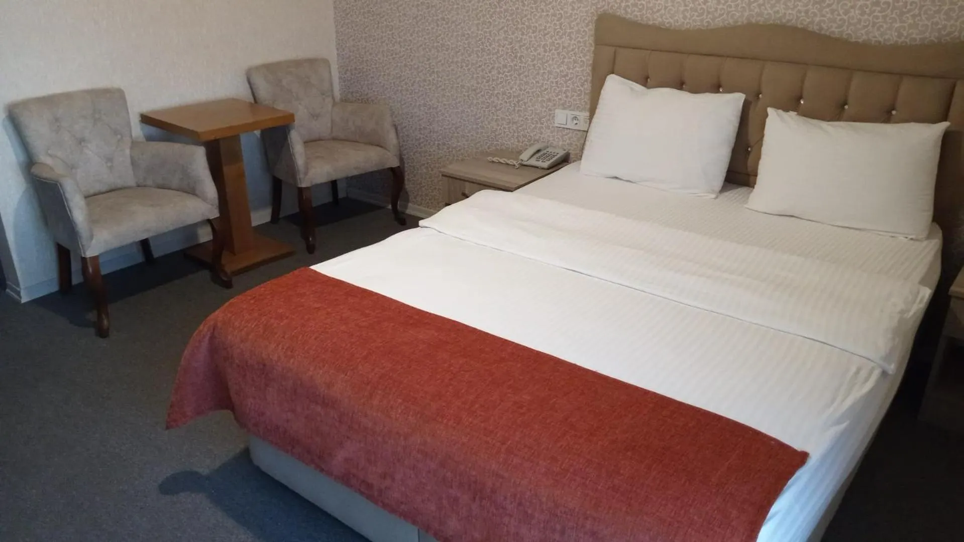 Bed in ANGRAND HOTEL