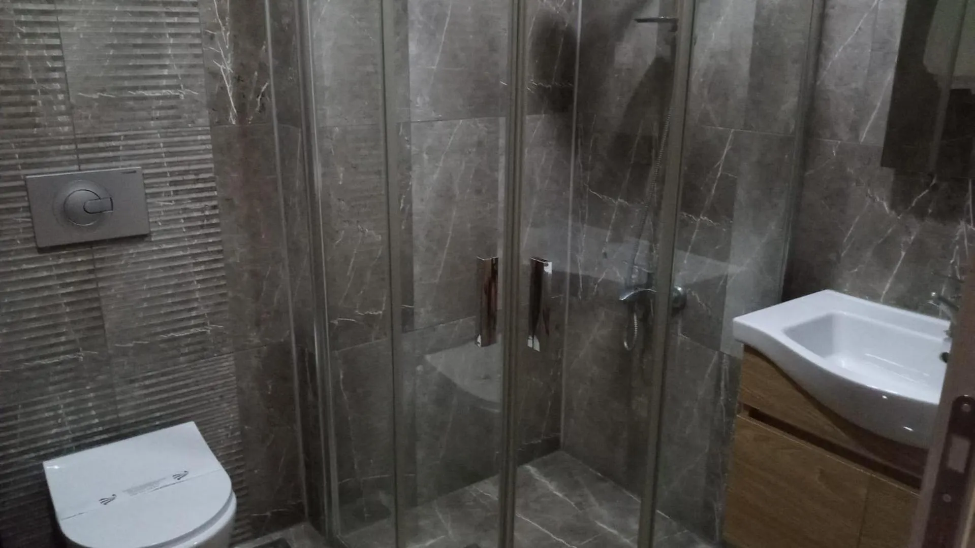 Shower in ANGRAND HOTEL