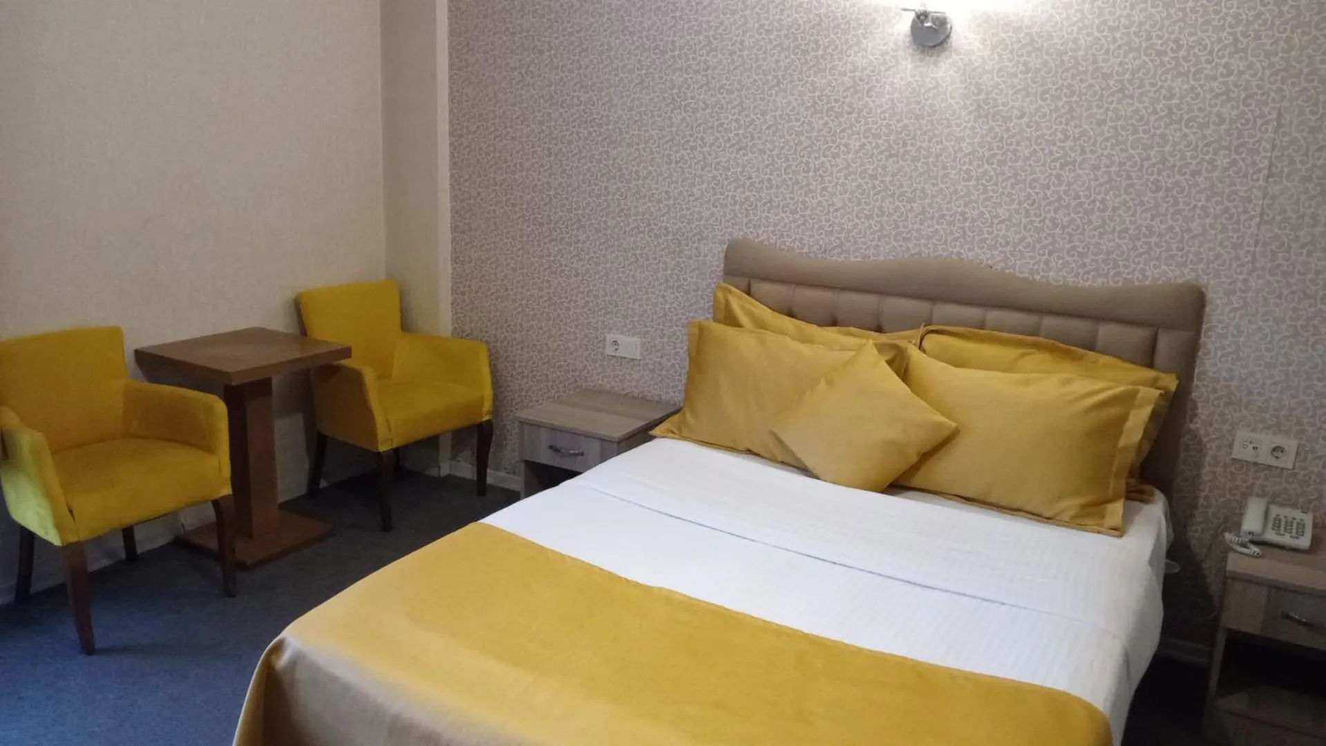 Bed in ANGRAND HOTEL