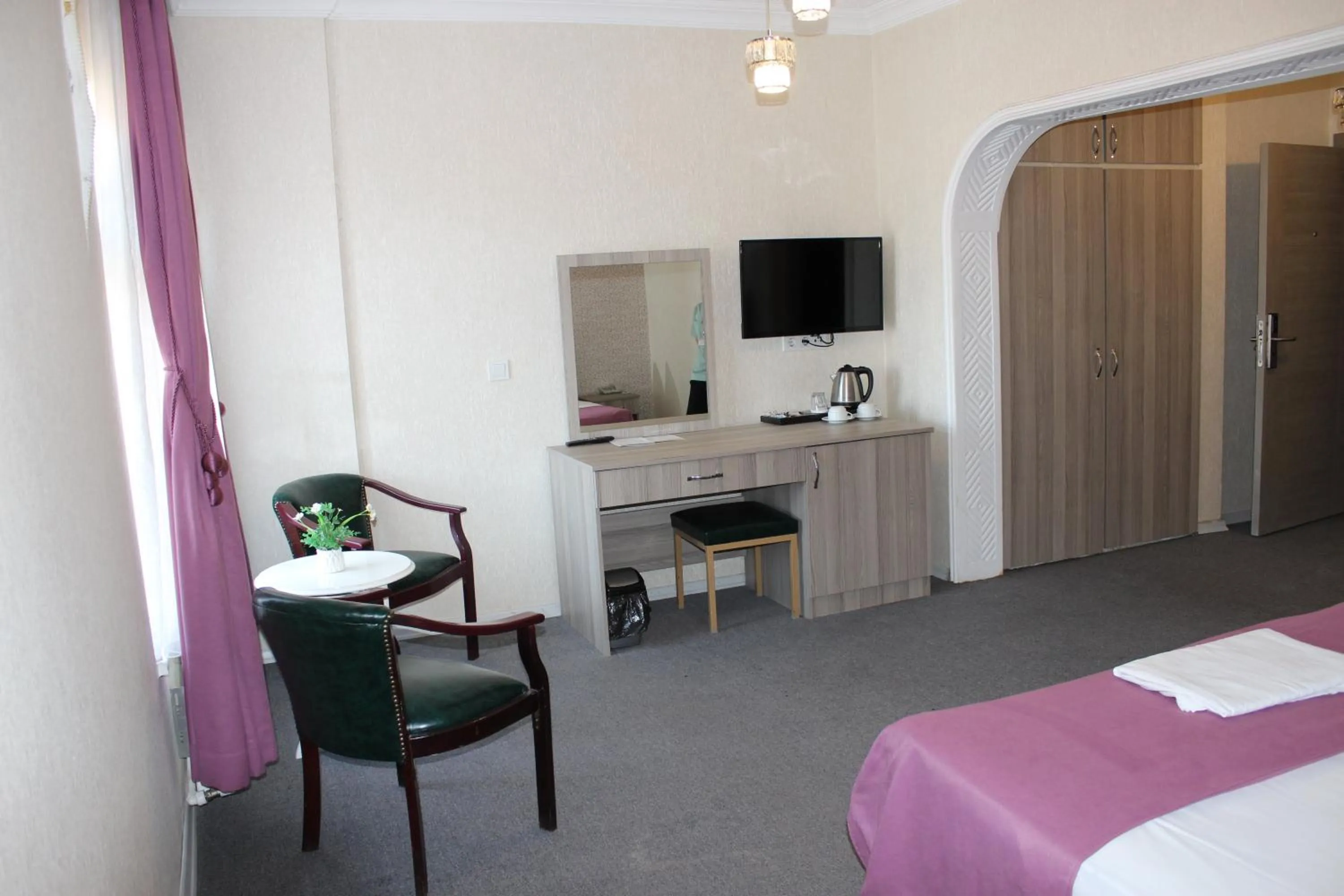 Bed in ANGRAND HOTEL