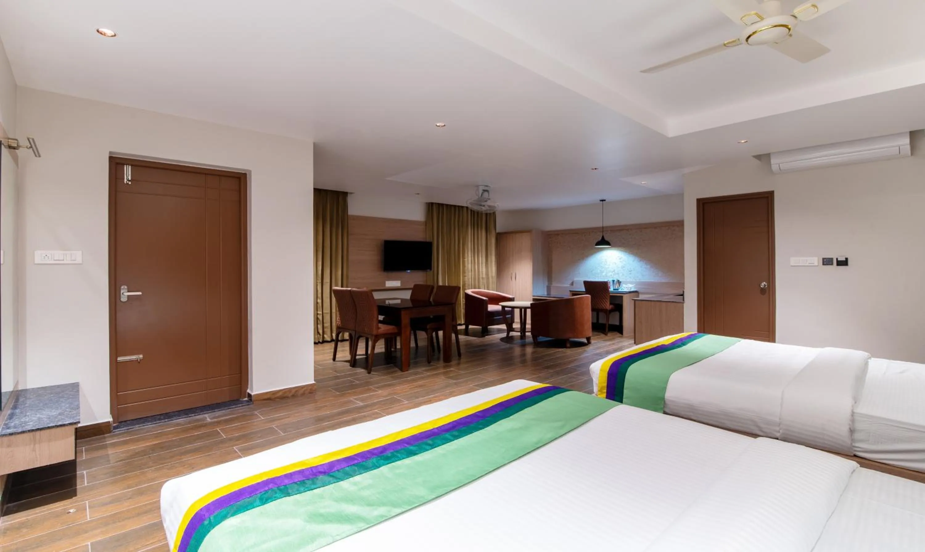 Bedroom, Bed in Treebo Premium New Light Suites