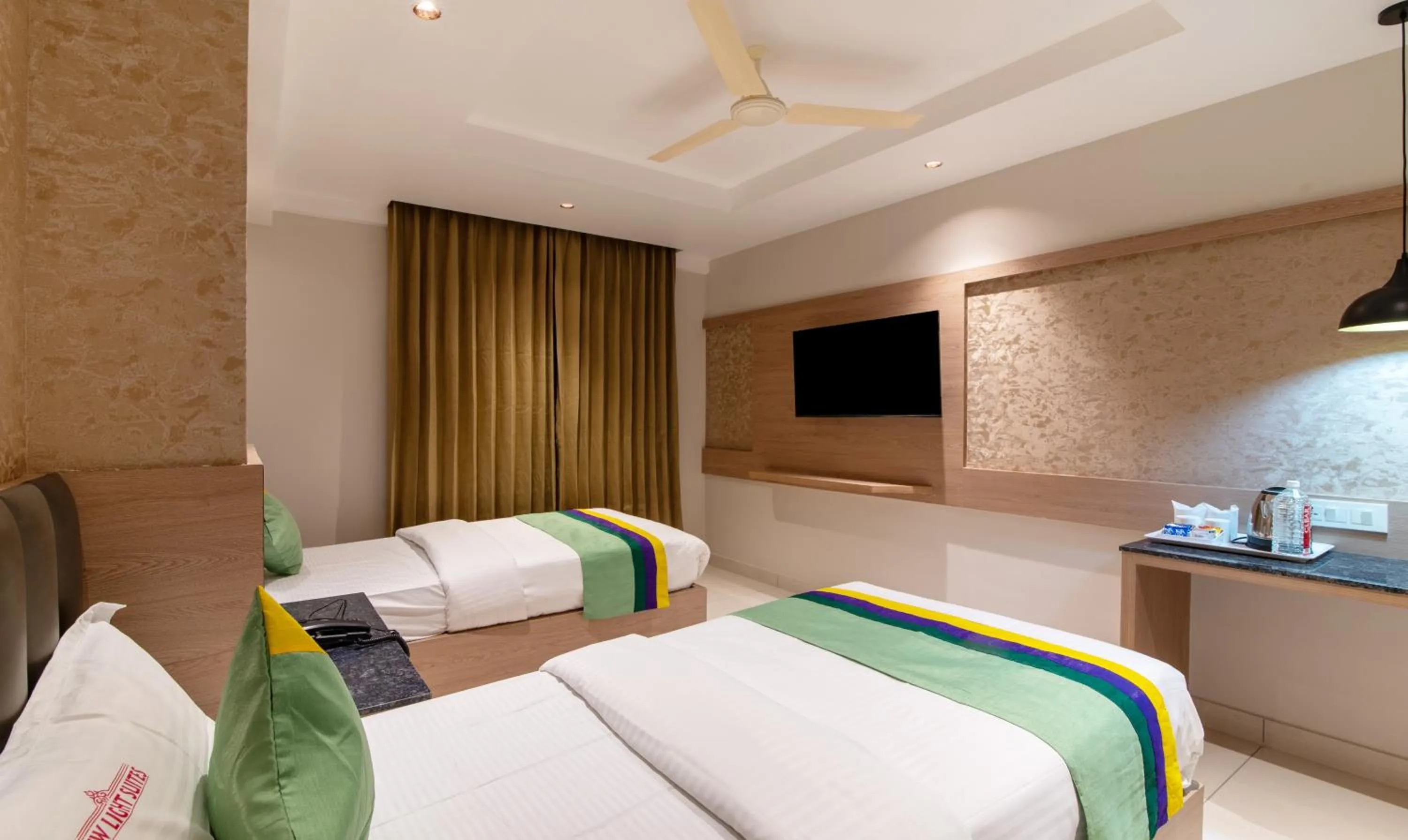 Bedroom, Bed in Treebo Premium New Light Suites