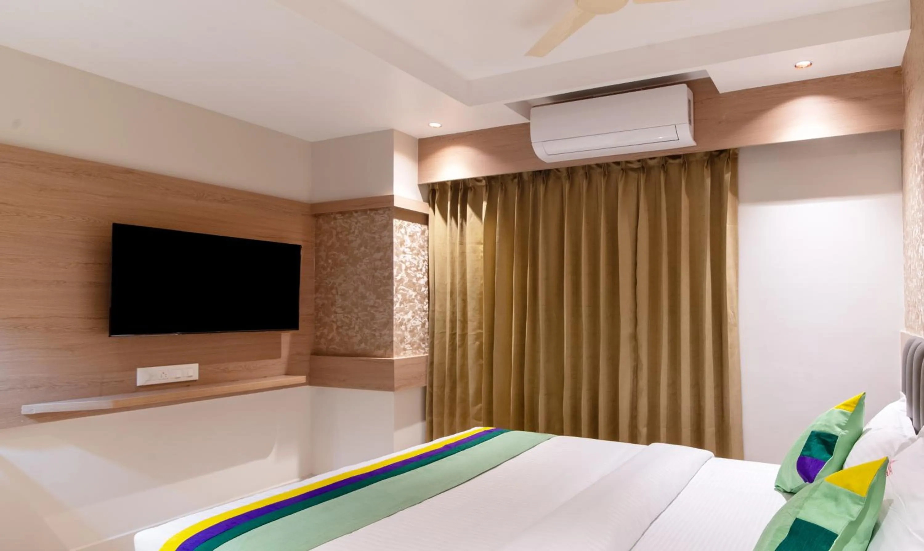 Bedroom, Bed in Treebo Premium New Light Suites