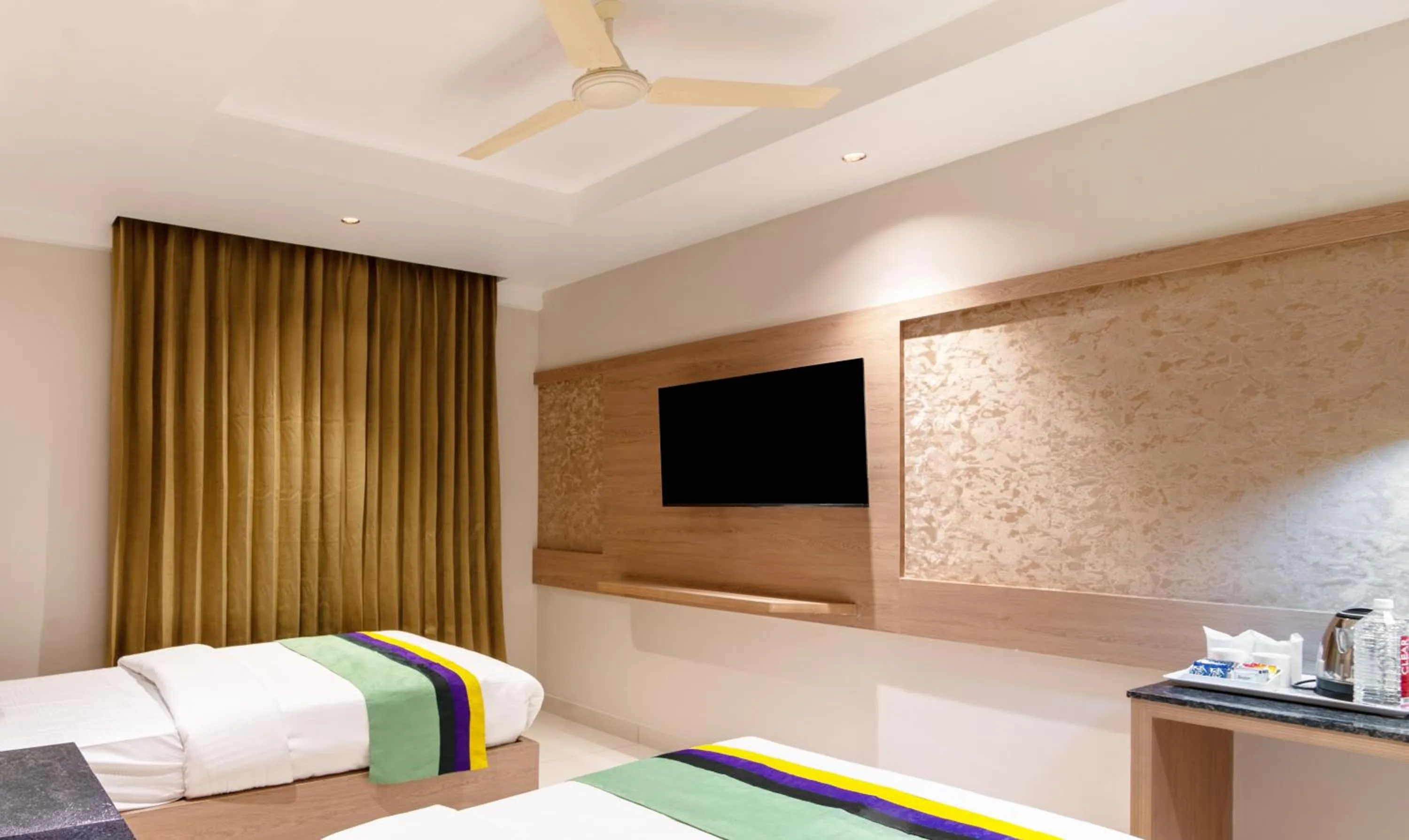 Bedroom, Bed in Treebo Premium New Light Suites