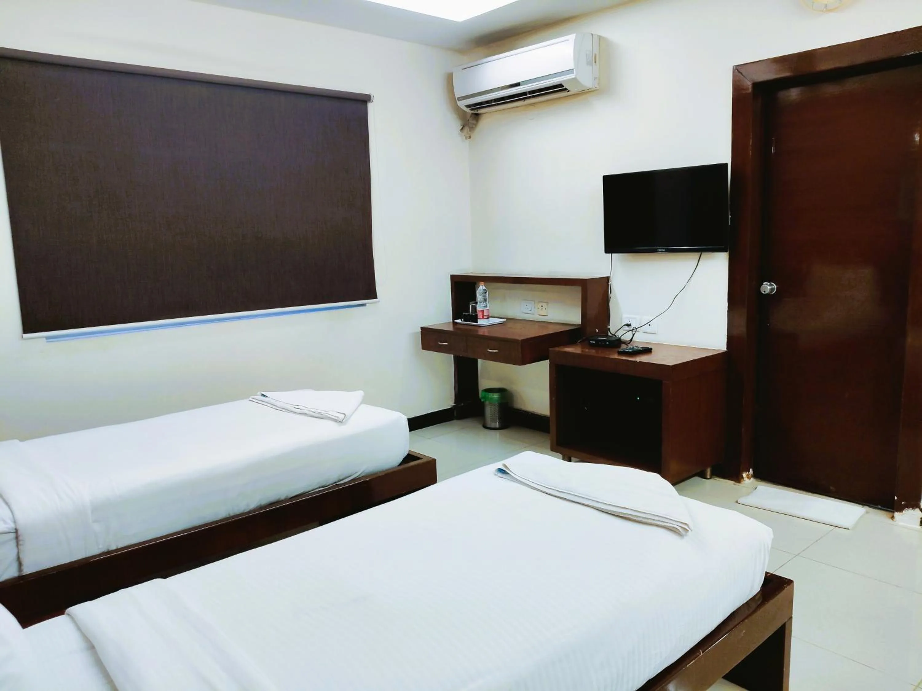 Bed in Athasri Hotel Infantry Road