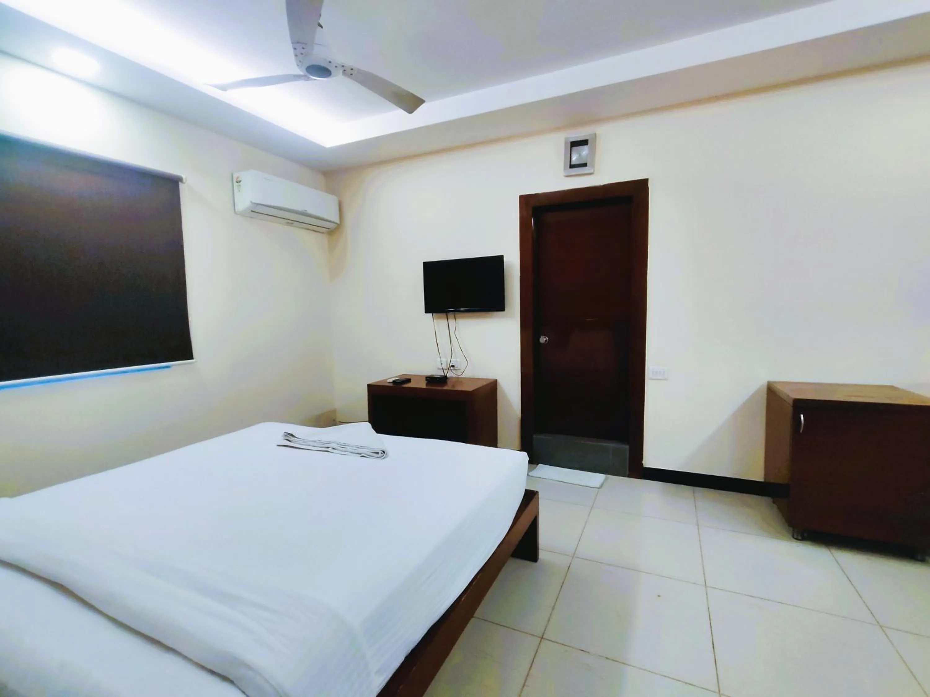 Bed in Athasri Hotel Infantry Road