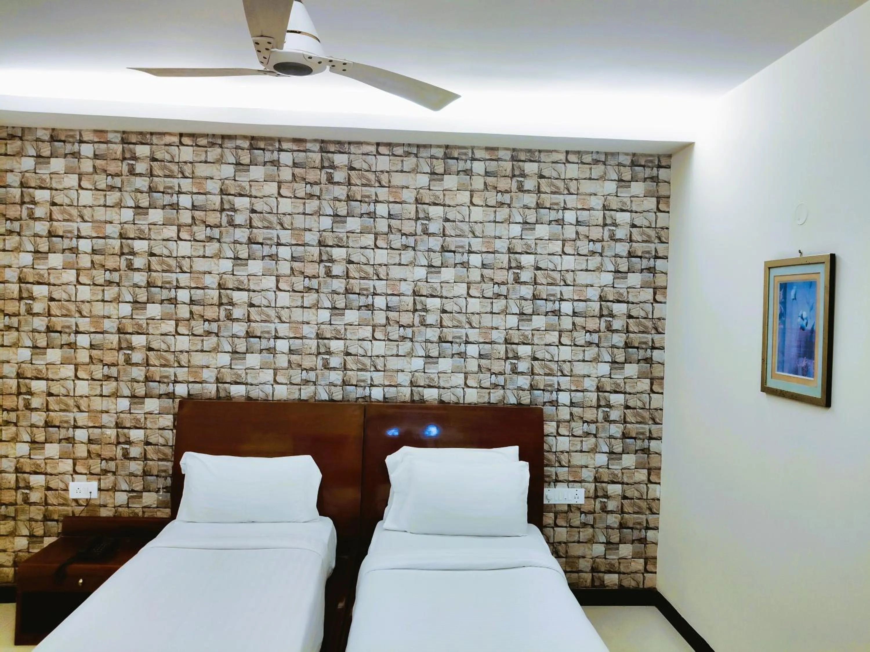 Bed in Athasri Hotel Infantry Road