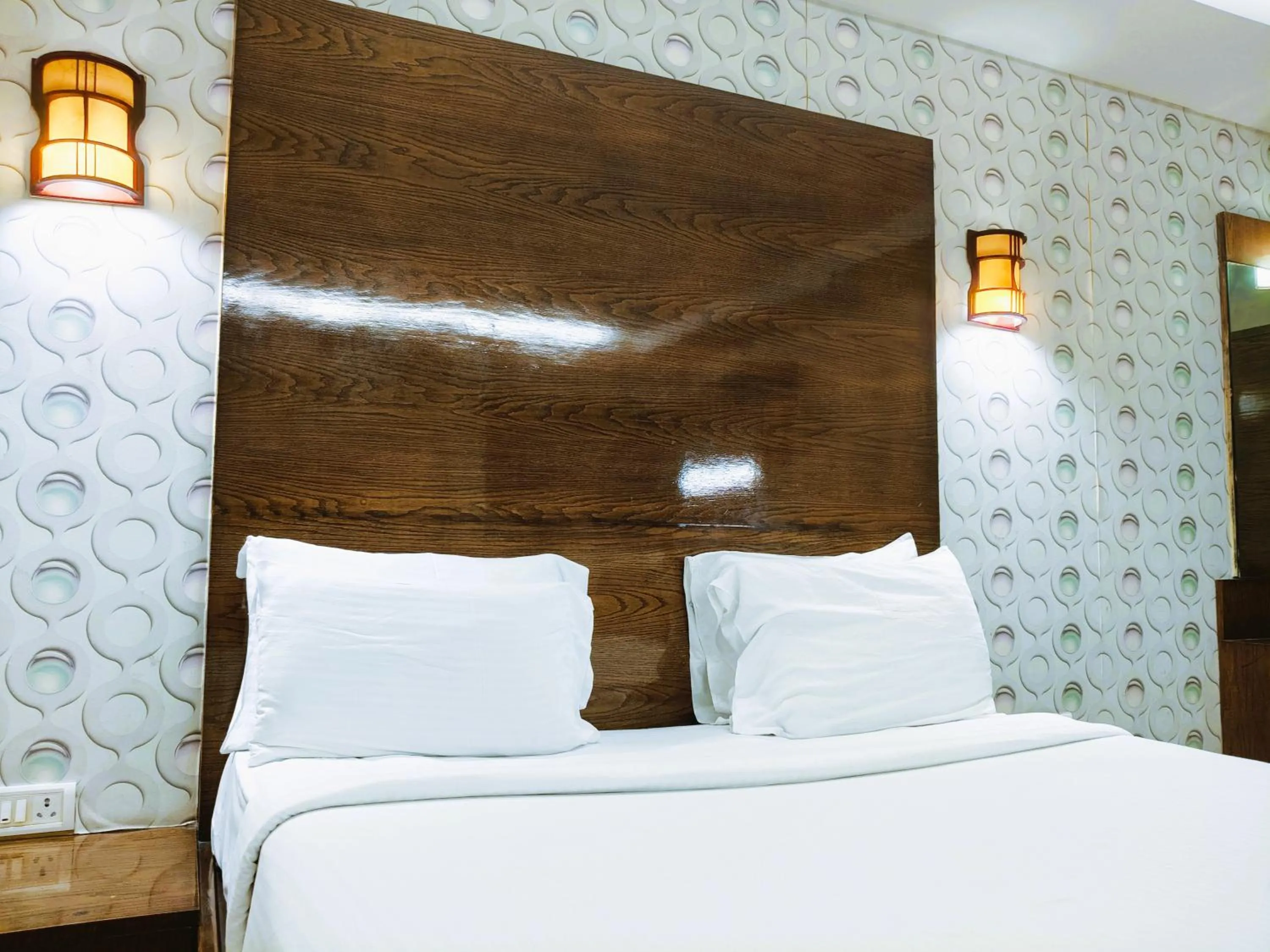 Bed in Athasri Hotel Infantry Road