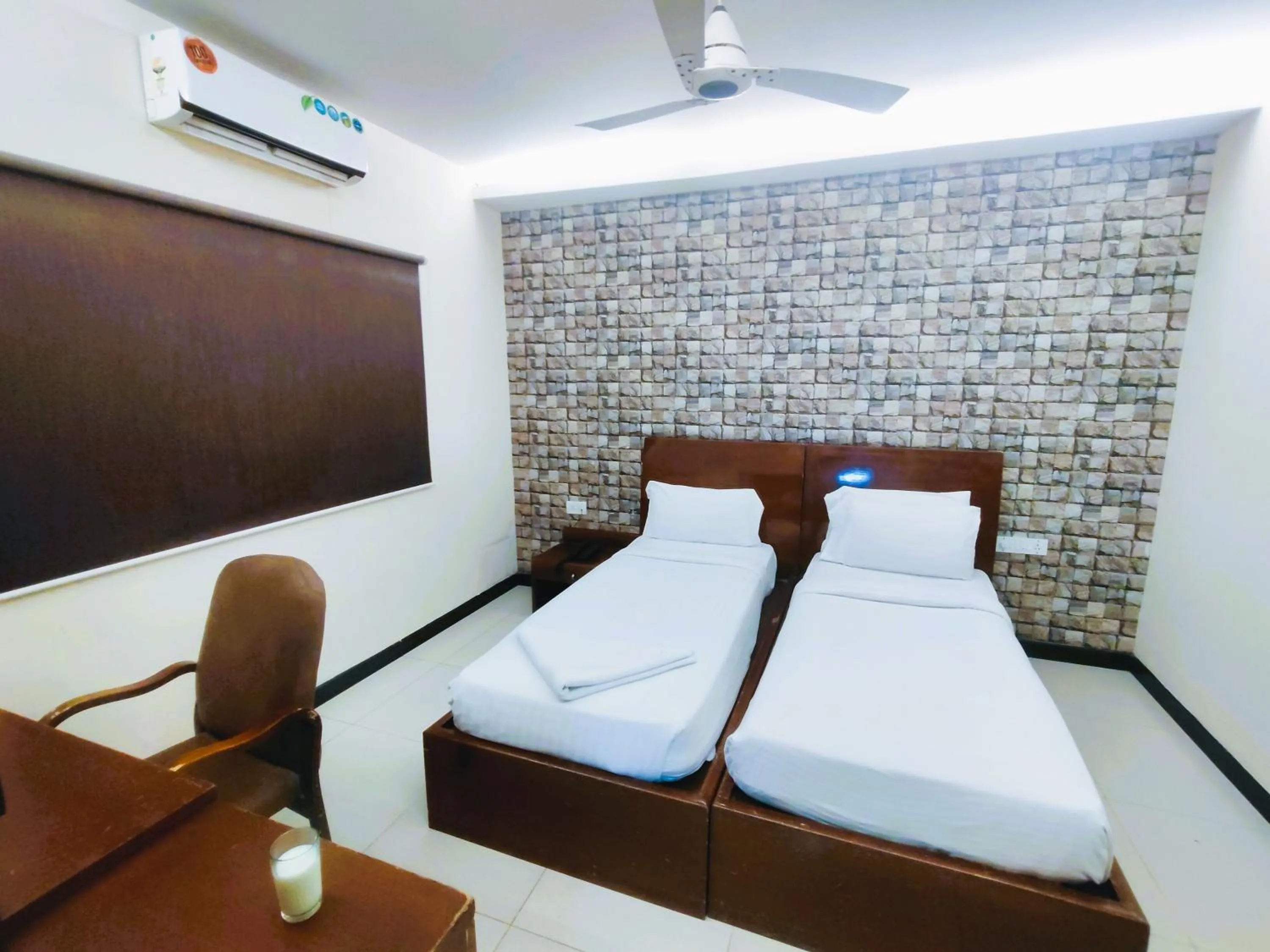 Bed in Athasri Hotel Infantry Road