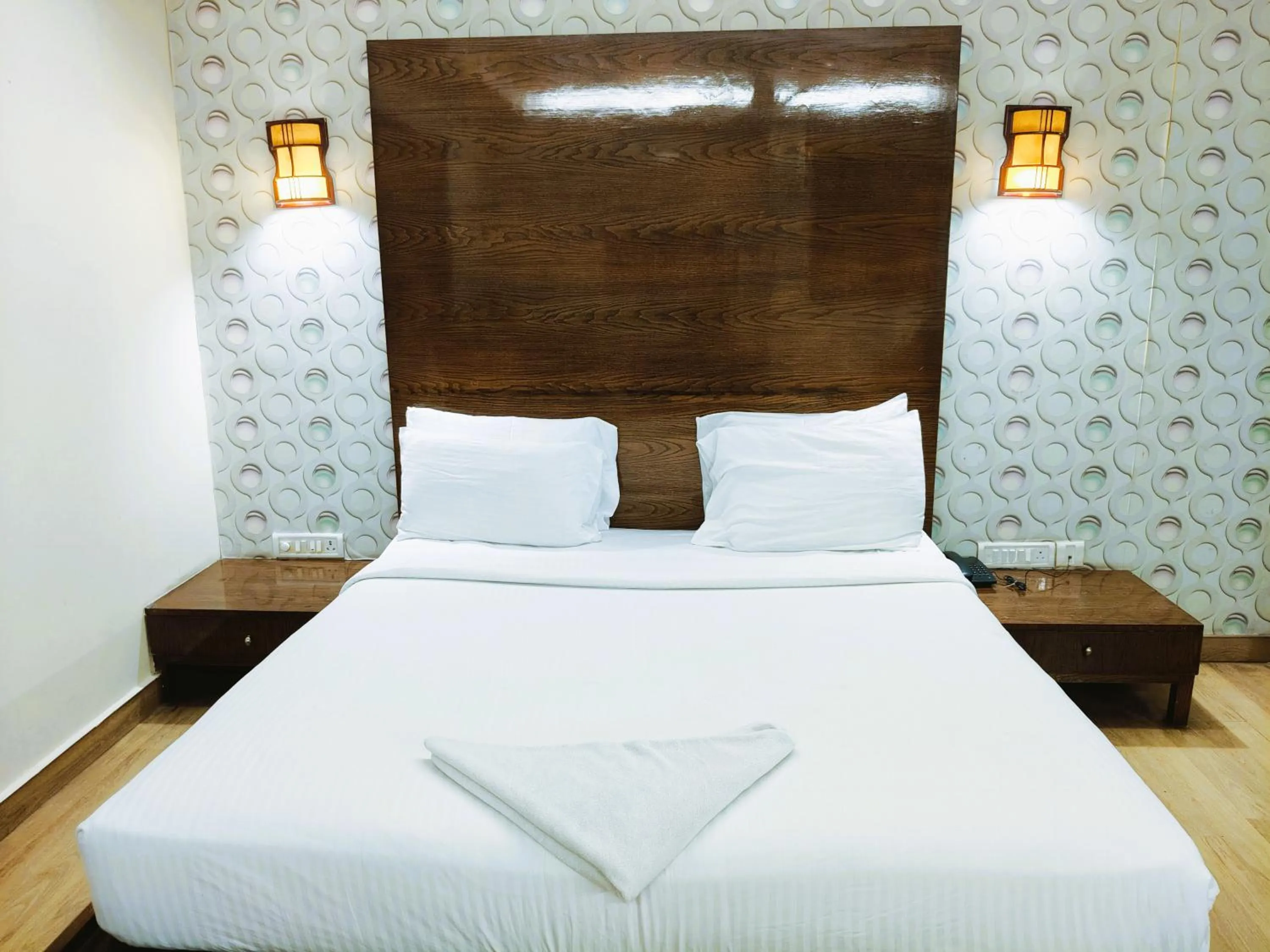 Bed in Athasri Hotel Infantry Road