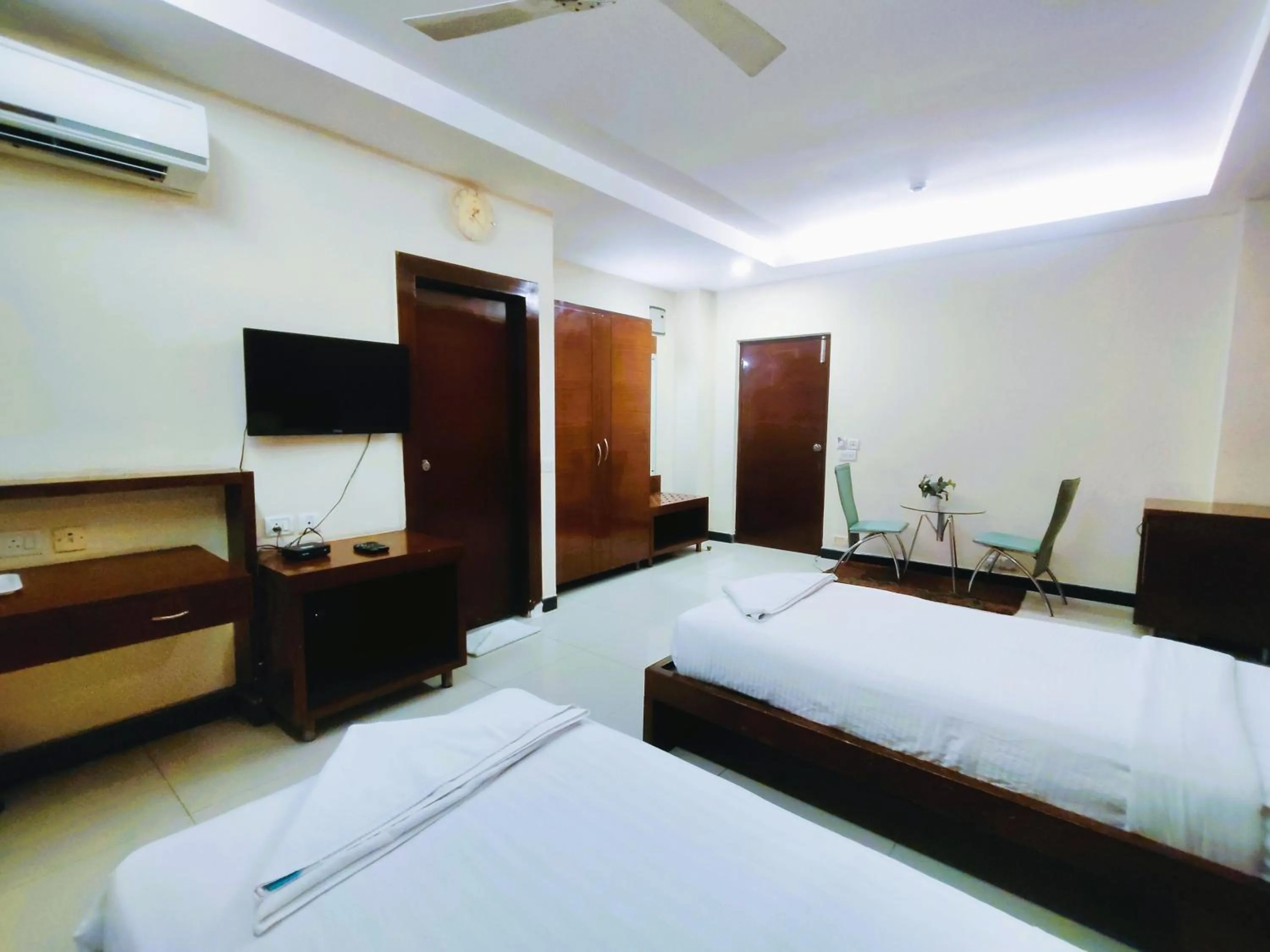 Bed in Athasri Hotel Infantry Road