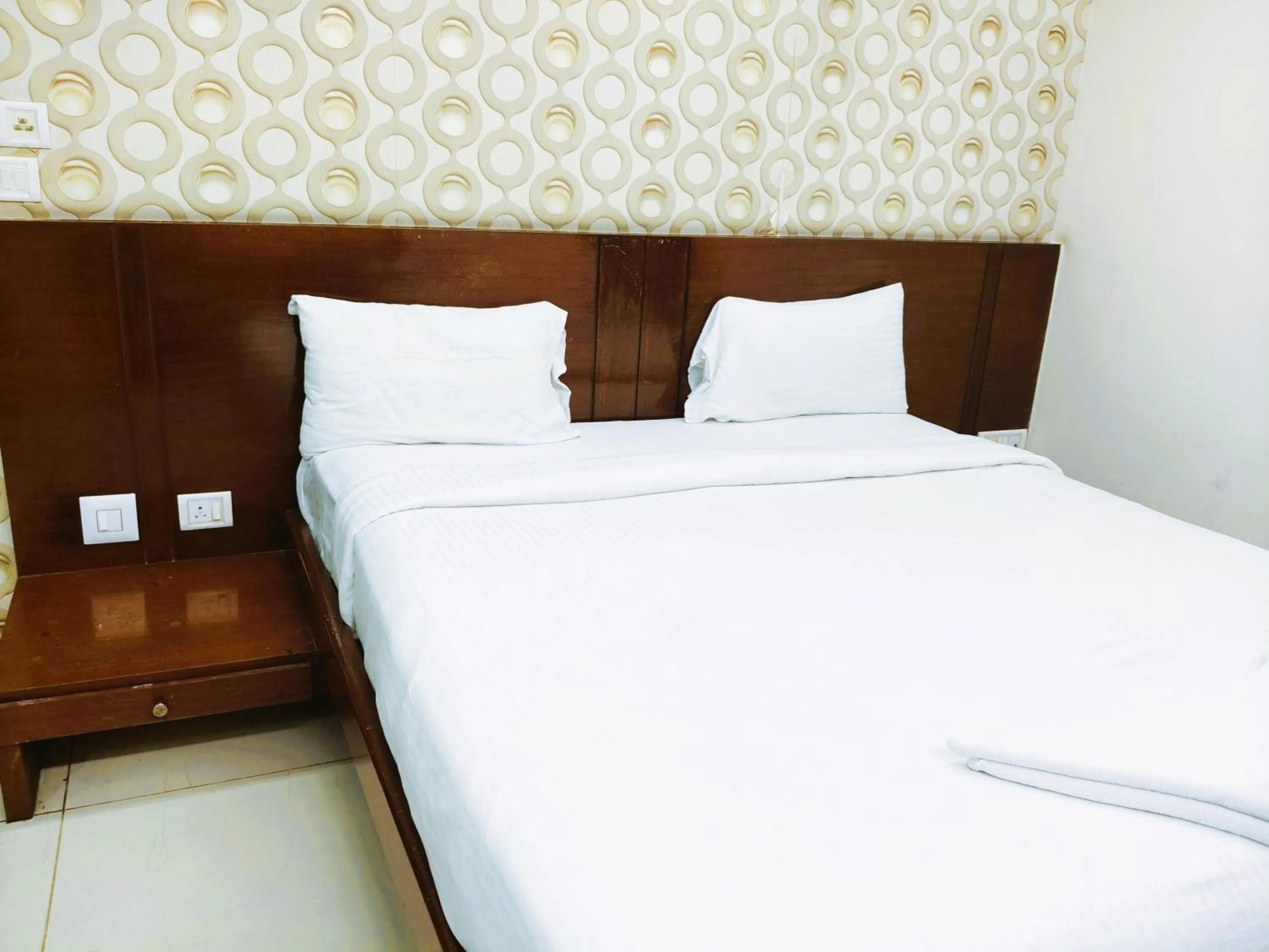 Bed in Athasri Hotel Infantry Road