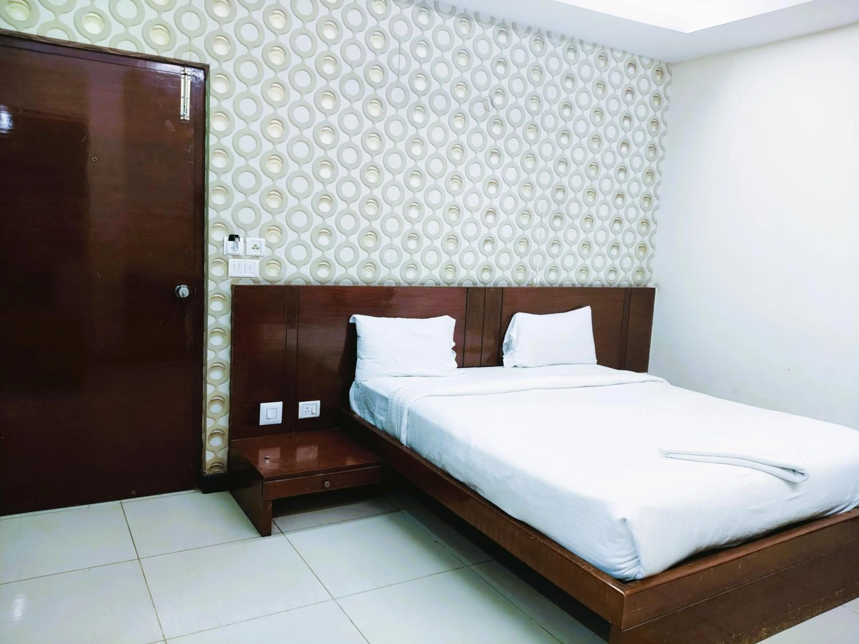 Bed in Athasri Hotel Infantry Road