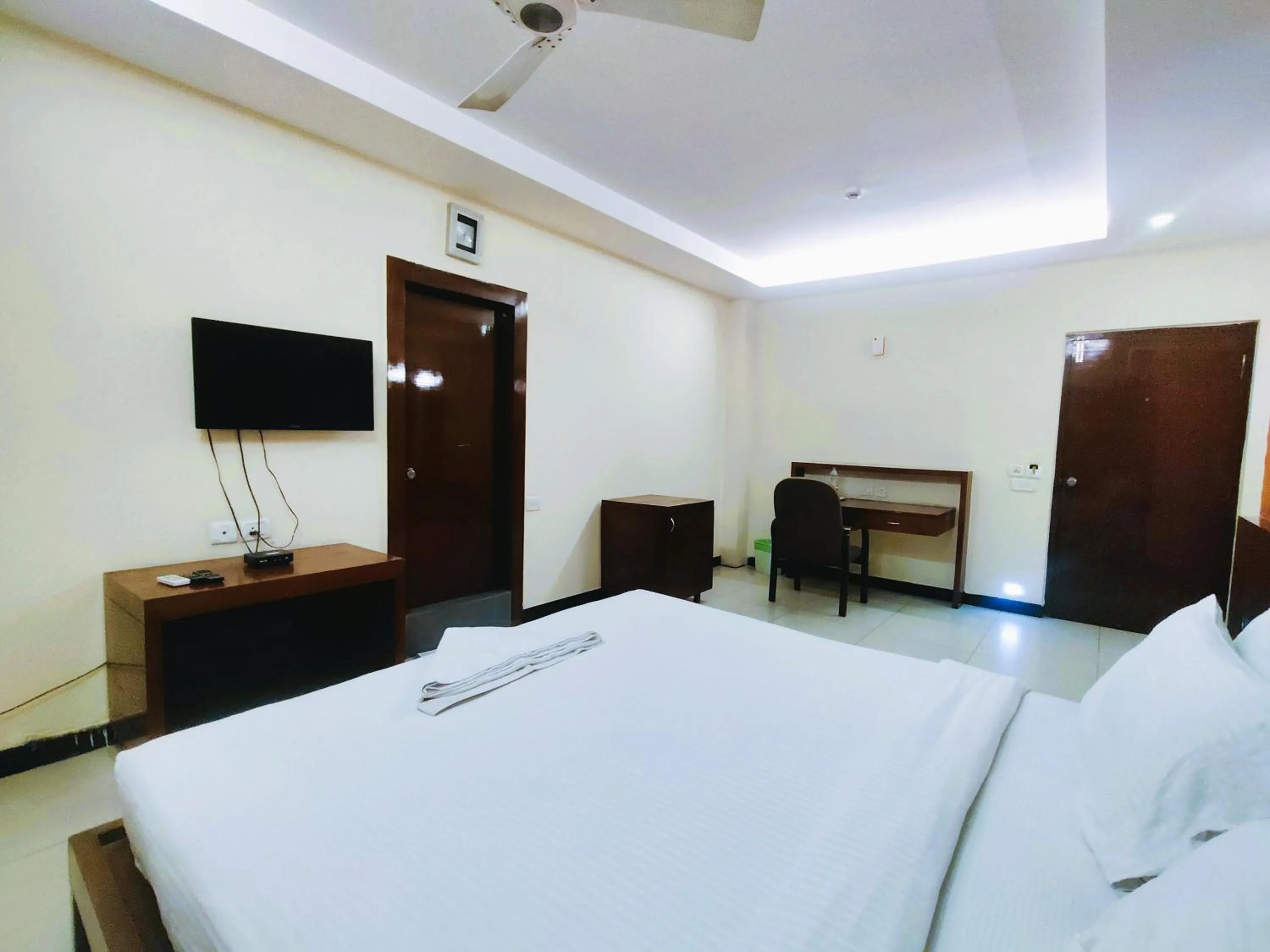 Bed in Athasri Hotel Infantry Road
