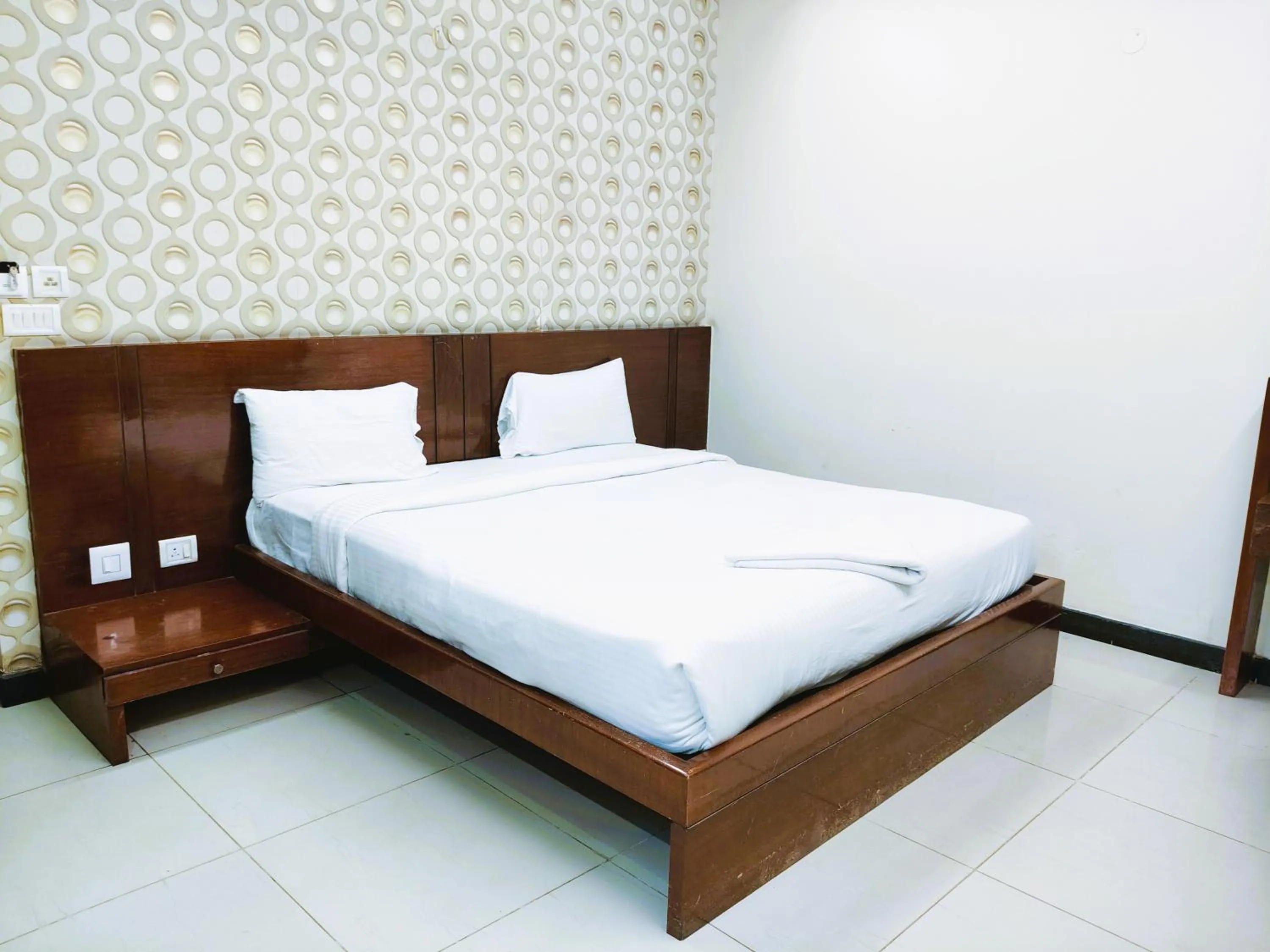Bed in Athasri Hotel Infantry Road
