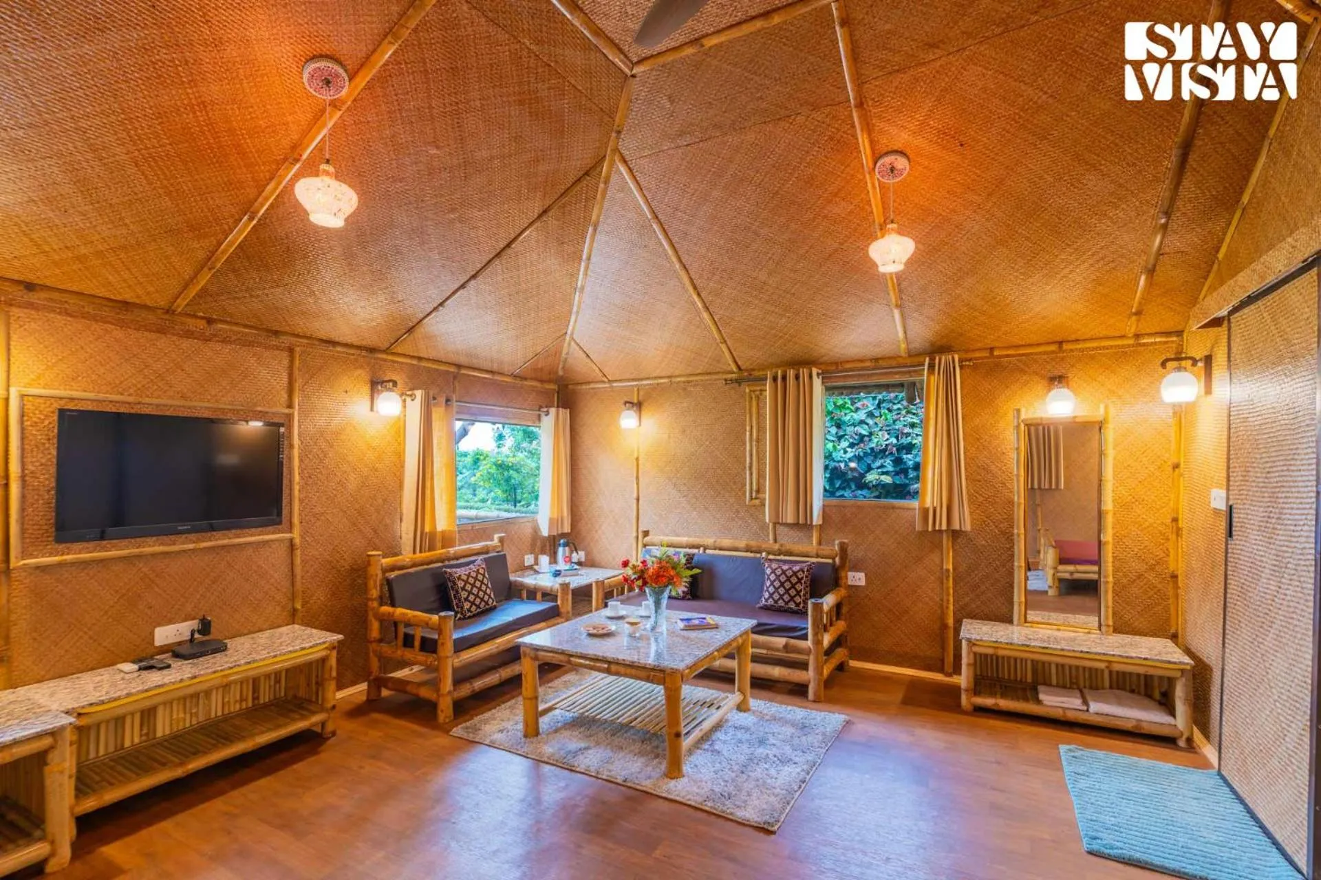 Living room in StayVista at Maple Farms with Pool, BBQ & Bonfire