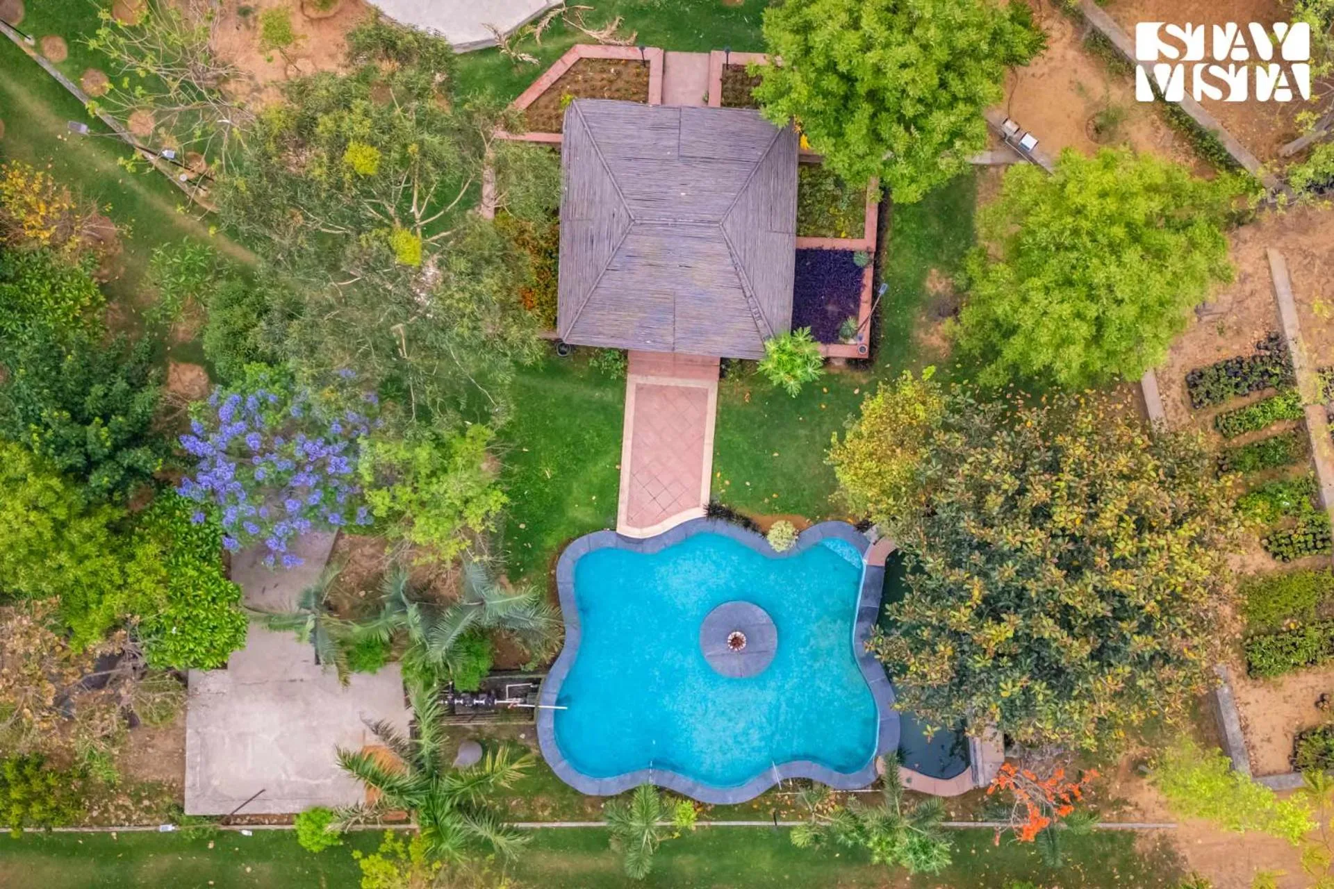 Property building in StayVista at Maple Farms with Pool, BBQ & Bonfire