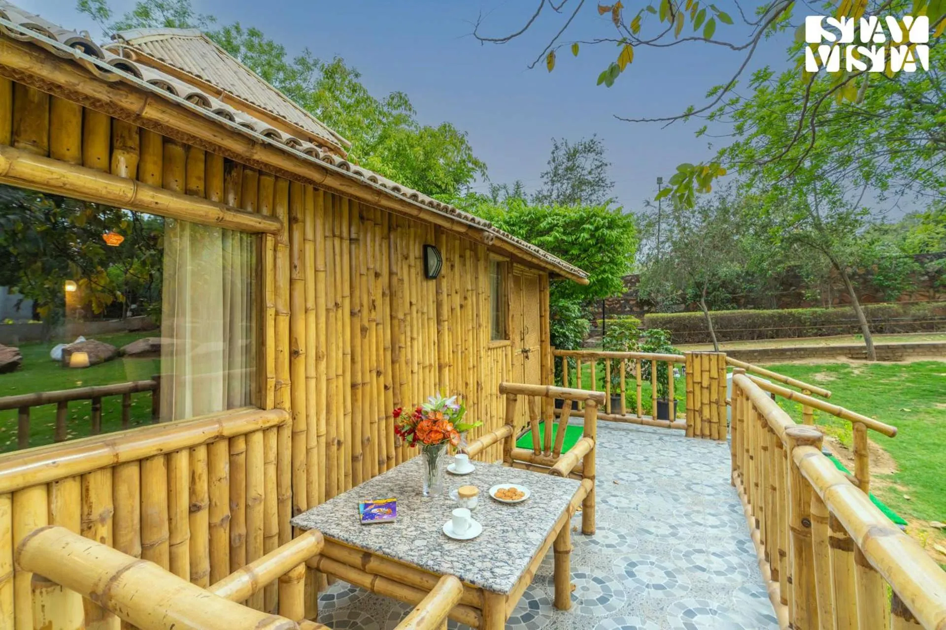 Seating area in StayVista at Maple Farms with Pool, BBQ & Bonfire