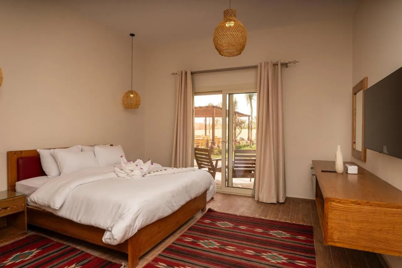 Bed in Azad Siwa Hotel